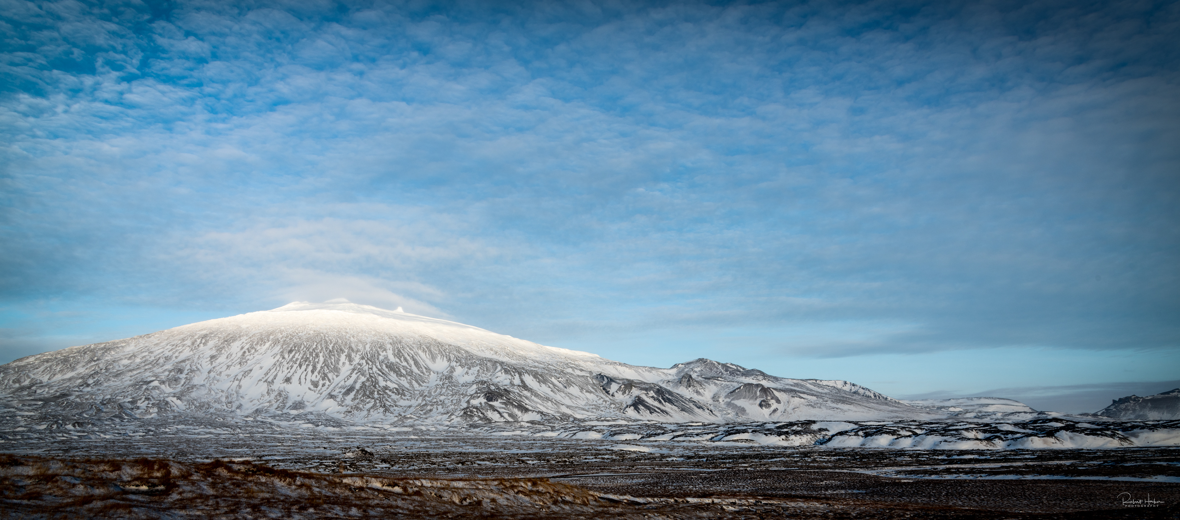 Snæfellsjðkull glacier near Lóndrangar Basalt Cliffs
