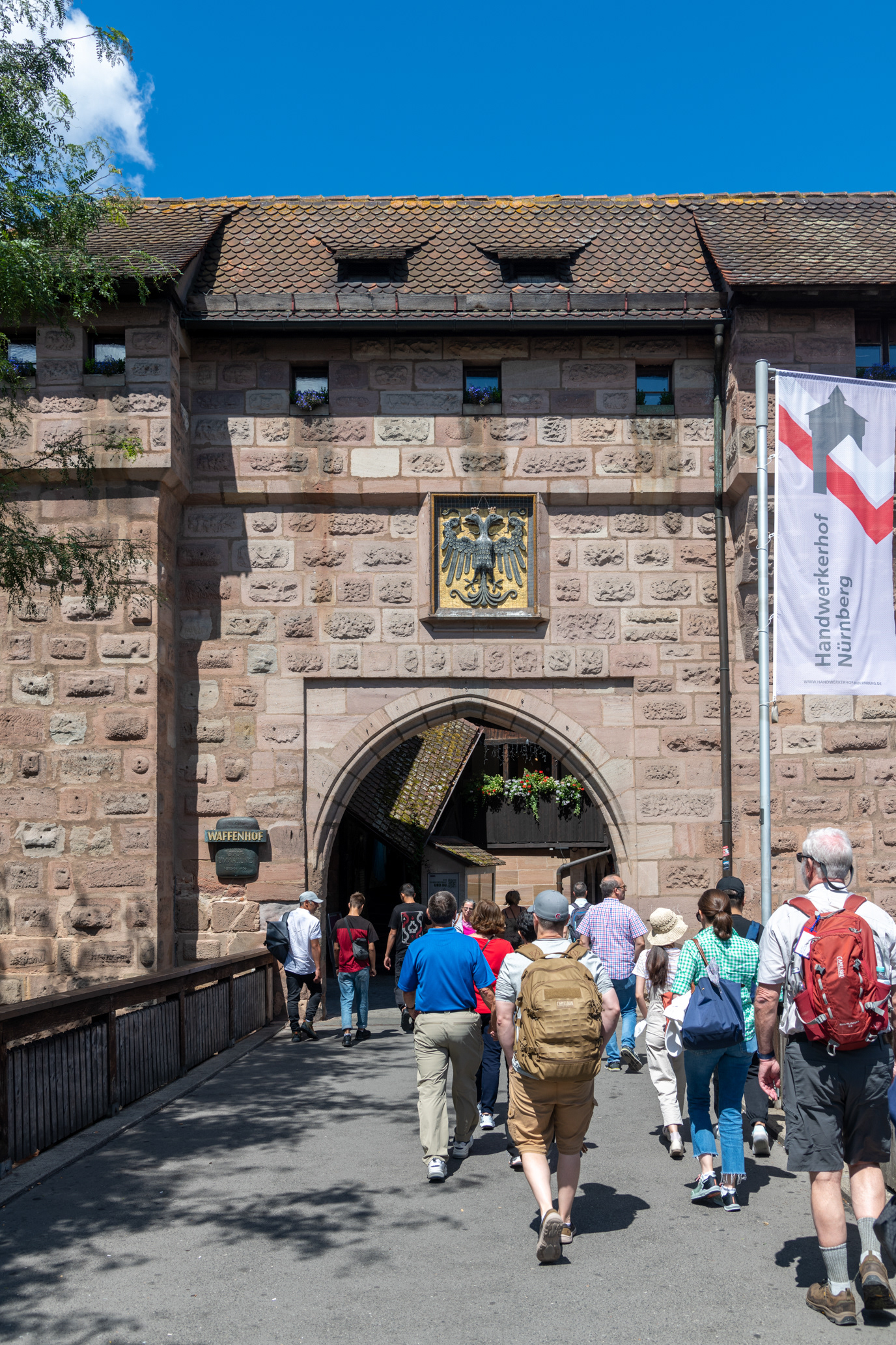 Pilgrims entering the walled city of Nuremberg