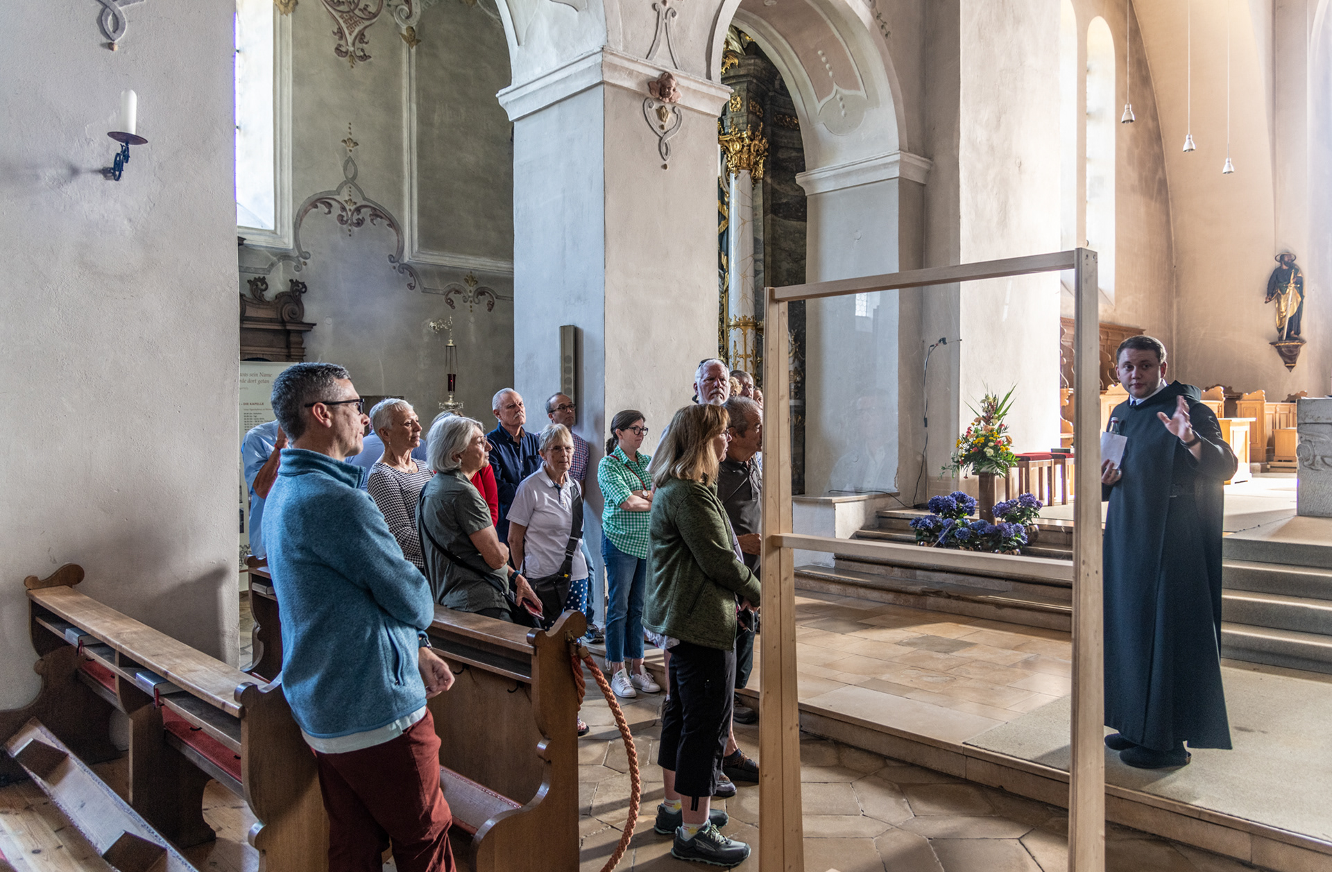 Brother Rabinos explaining the history of the abbey church