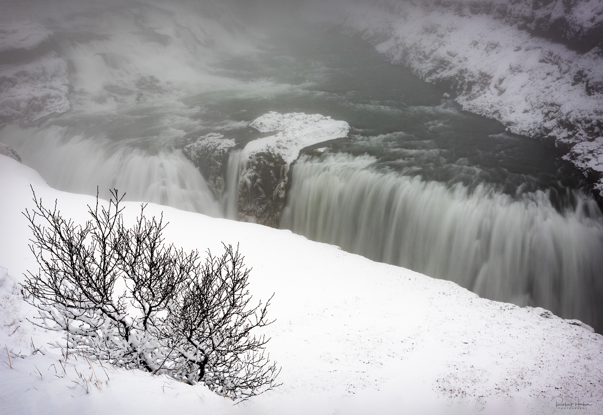 Gullfoss (Golden Falls) is the largest waterfall in all of Iceland.  The average amount of water running down the waterfall is 141 cubic metres (5,000 cu ft) per second in the summer and 80 cubic metres (2,800 cu ft) per second in the winter.