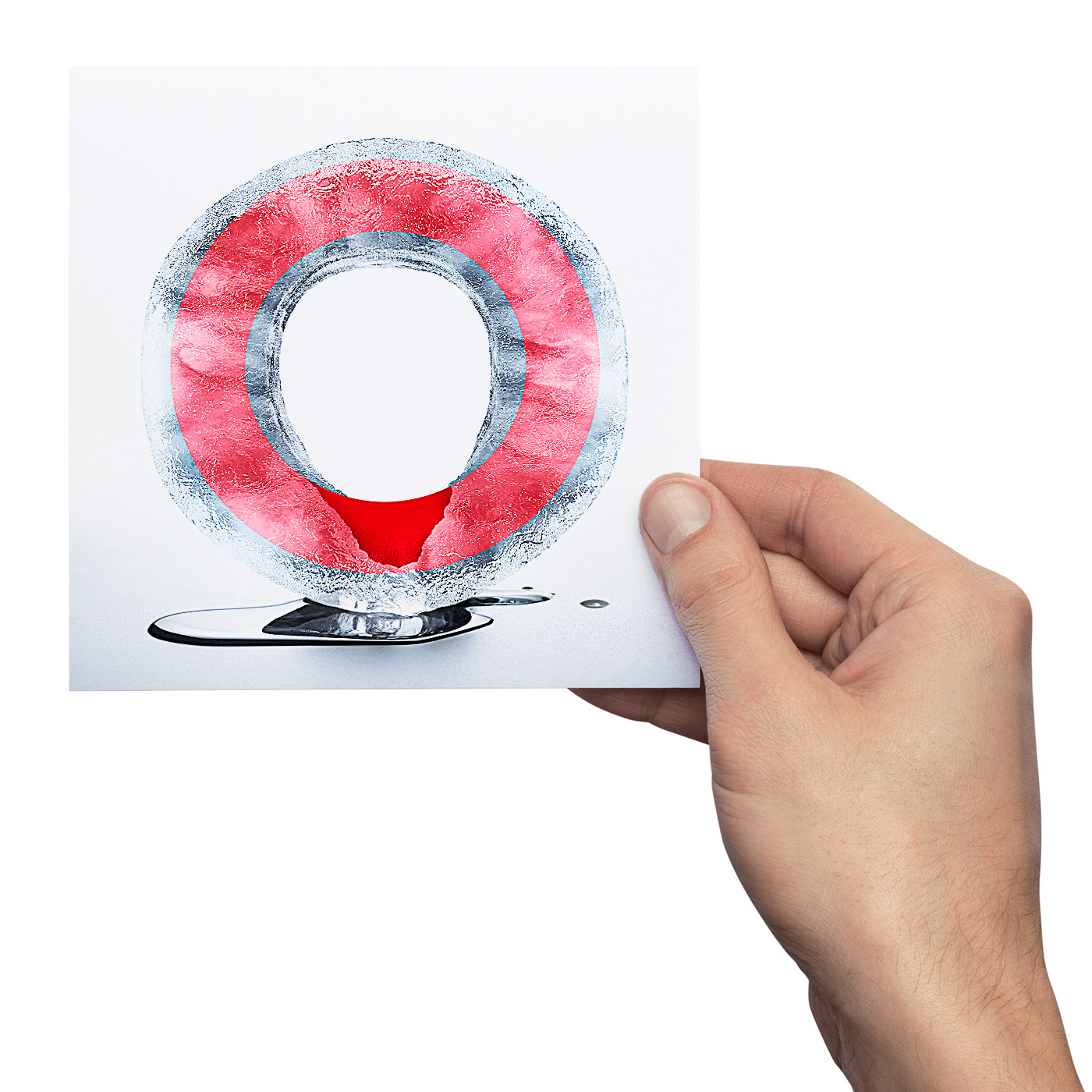 Hand holding the ishimodo 2011 Christmas card with promotional image on front cover.