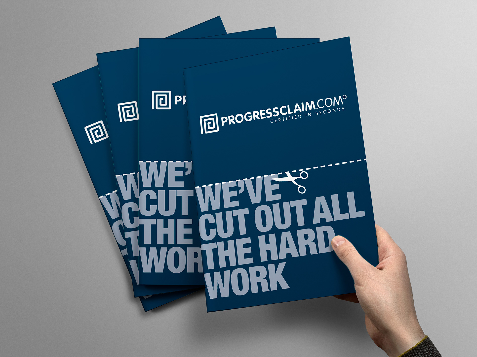 Front cover design with solid dark blue background, ProgressClaim.com logo on top, and large headline below dashed cut here line and scissor graphic.