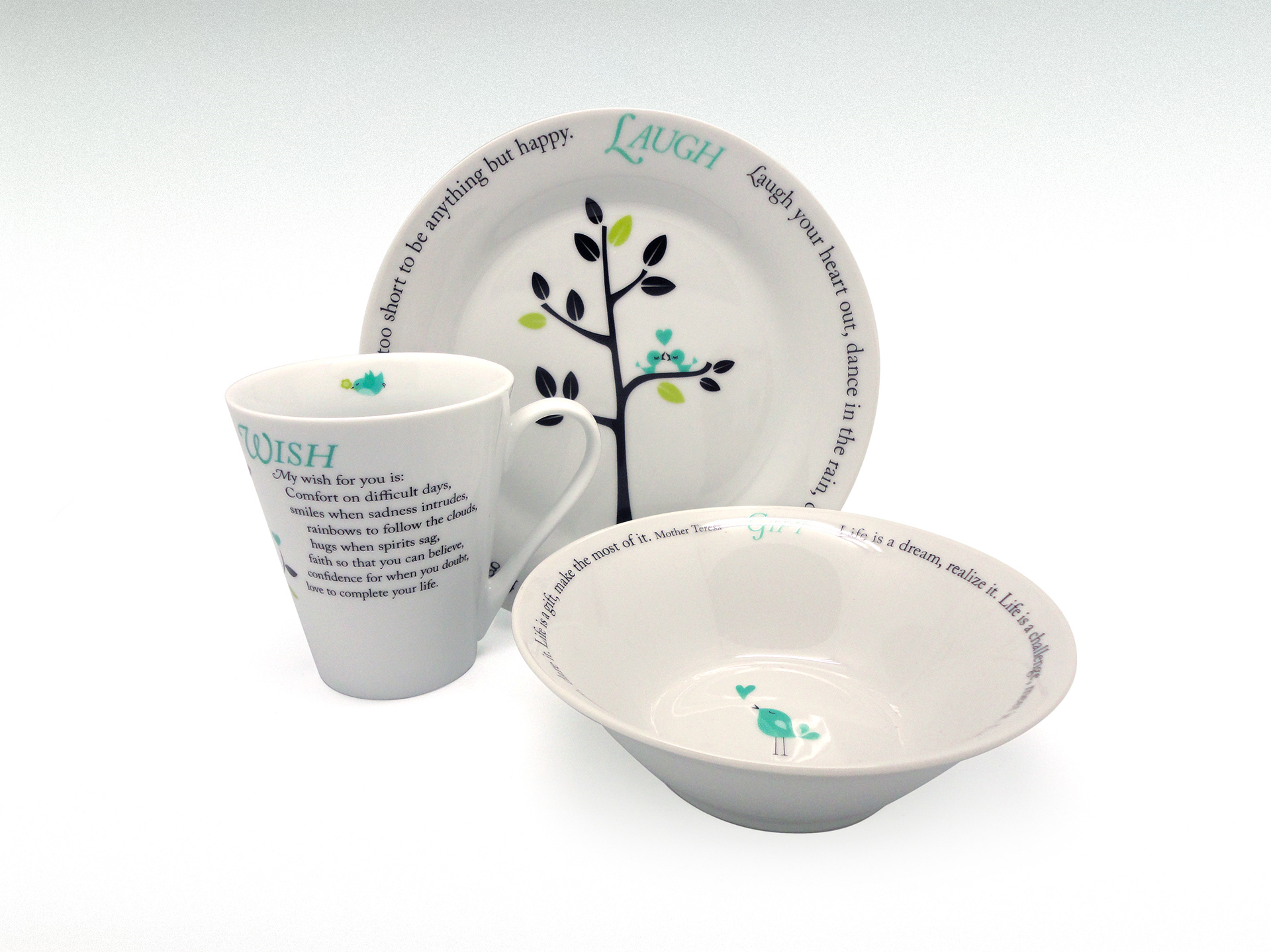 Breakfast set products comprising of a mug, plate and bowl with individual quotes on each.