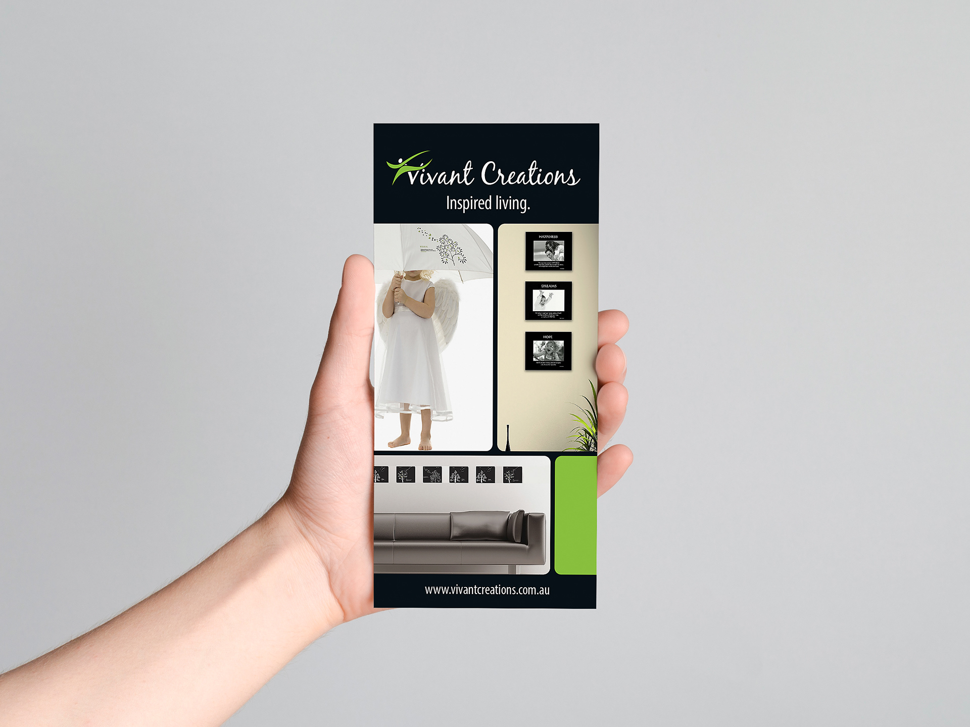 Hand holding DL sized Vivant Creations trade show flyer.