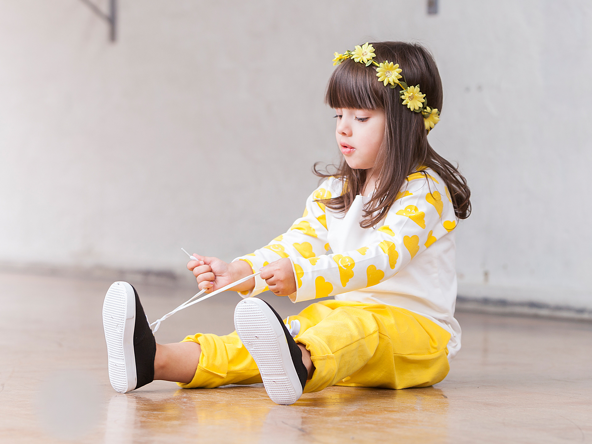 Little Yellow Cloud Long Sleeved T with patterned arms.