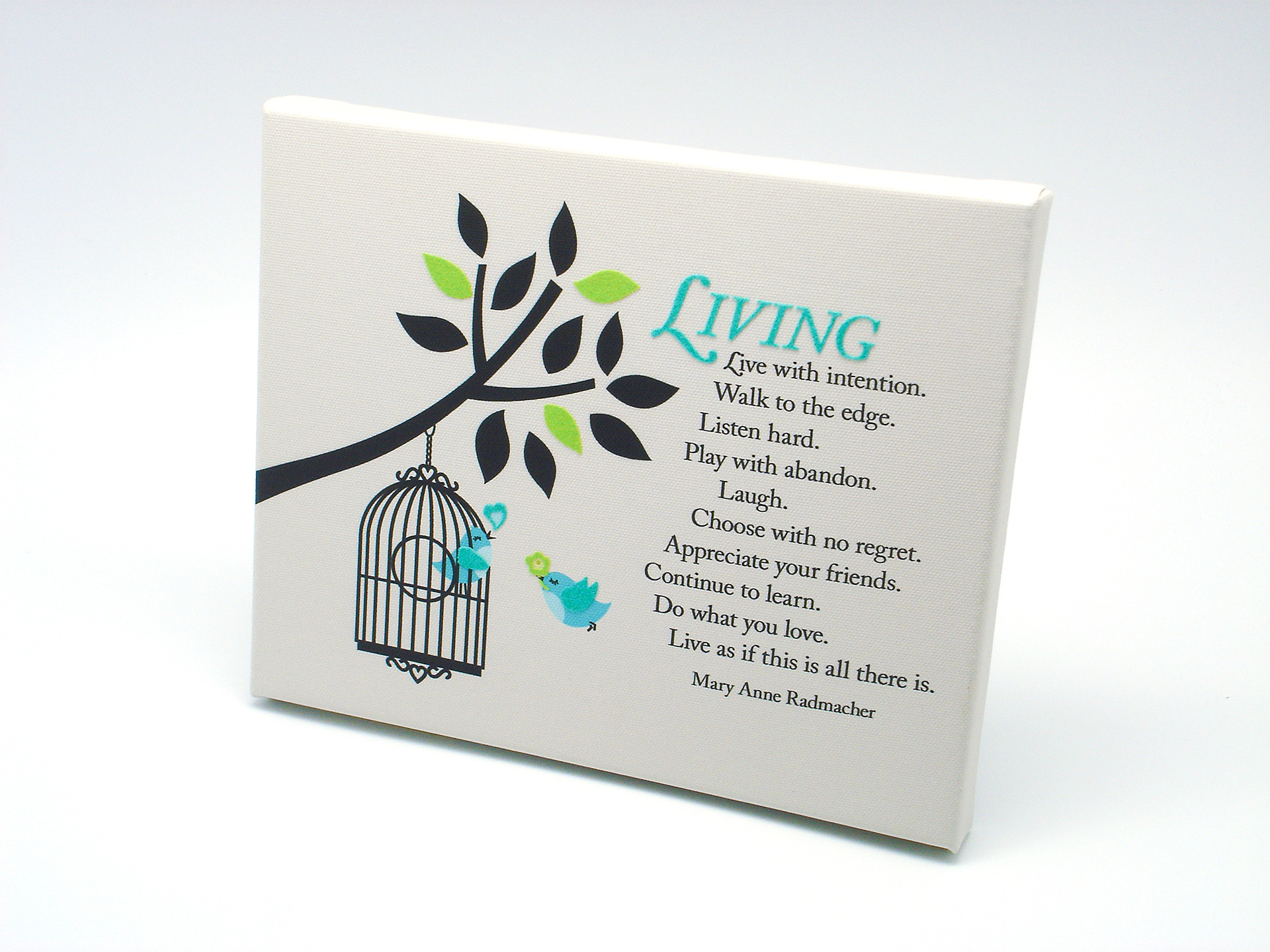 Living inspirational quote and birds in tree graphic on off white canvas material.