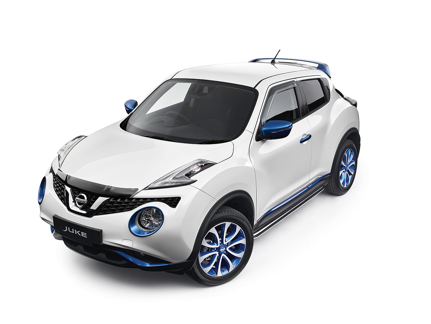 Unedited White Nissan Juke with blue trim.