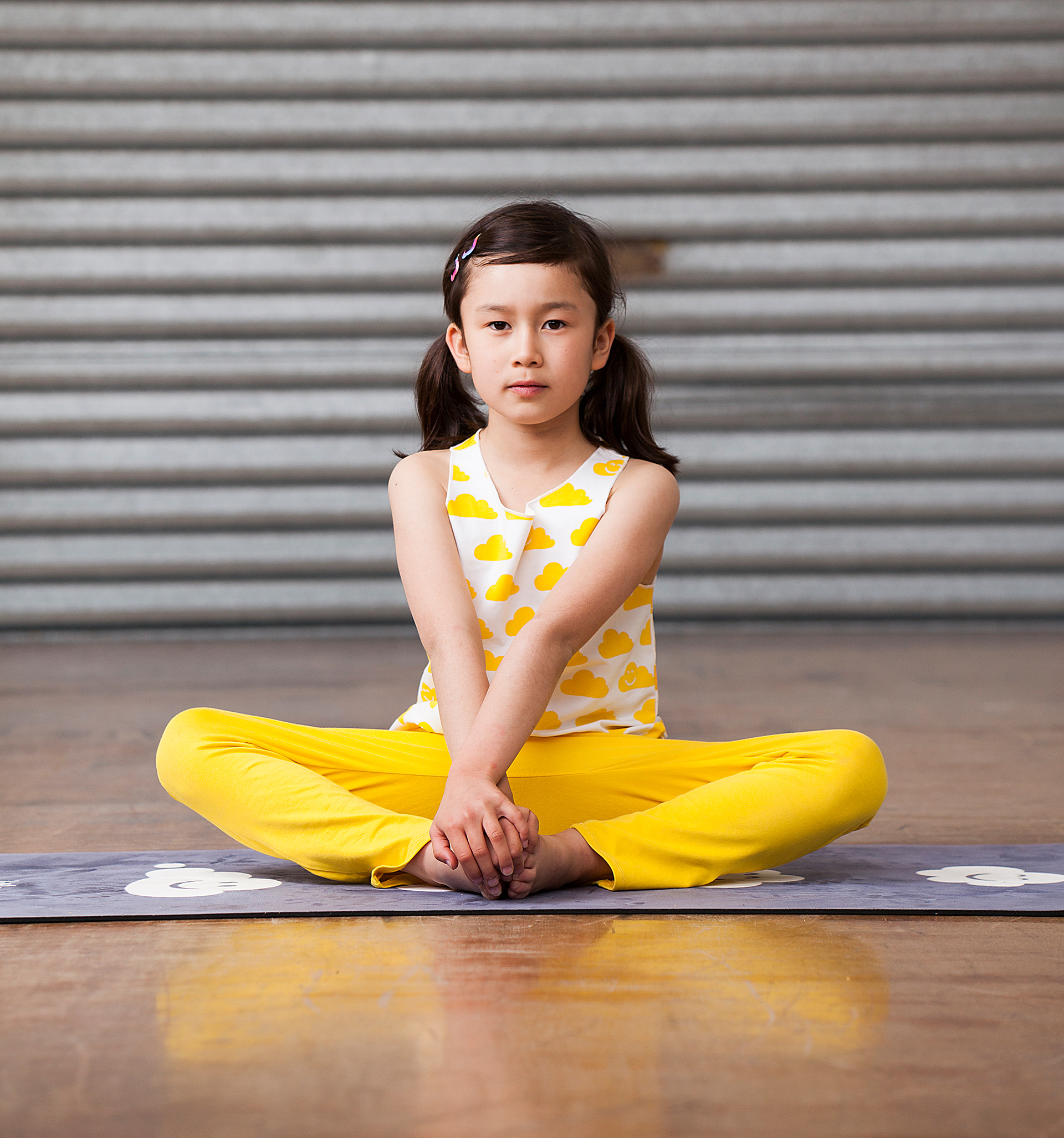 Daily yoga practice on the Little Yellow Cloud mat.