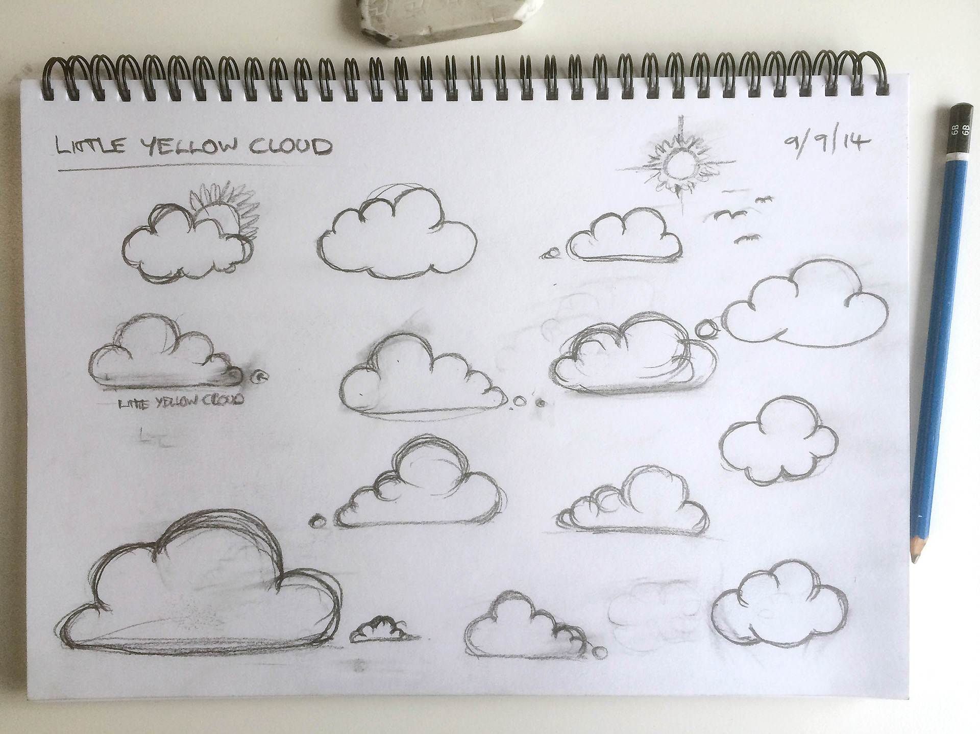 Sketchbook page showing the design variations drawn in pencil.