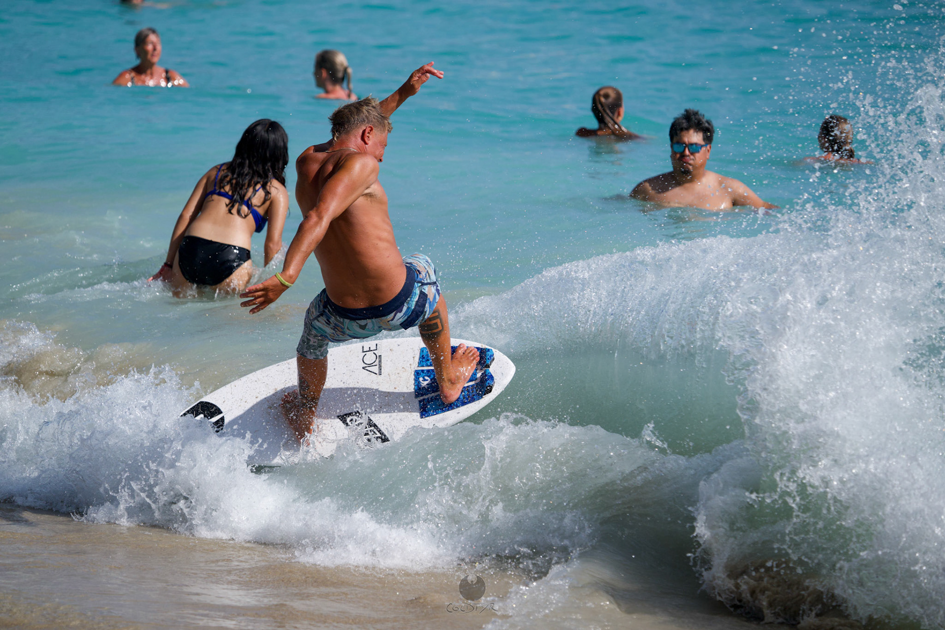 Brian "Hollywood" rips the Waikiki shore break.