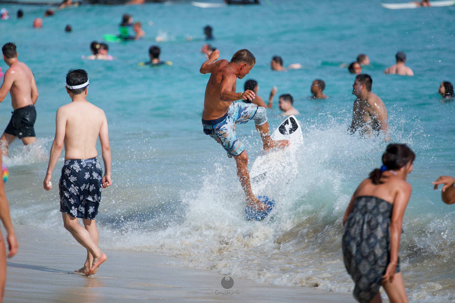 Brian "Hollywood" rips the Waikiki shore break.