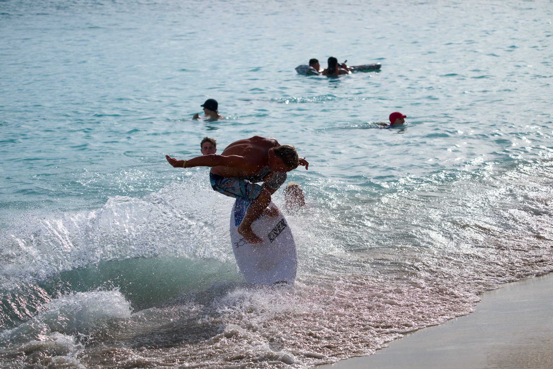 Brian "Hollywood" rips the Waikiki shore break.