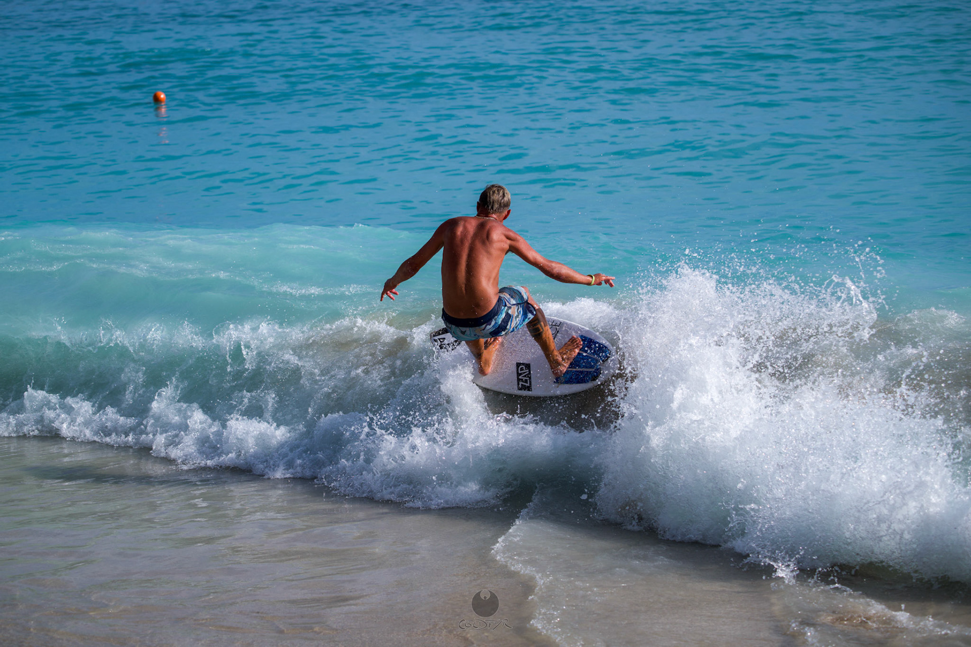 Brian "Hollywood" rips the Waikiki shore break.
