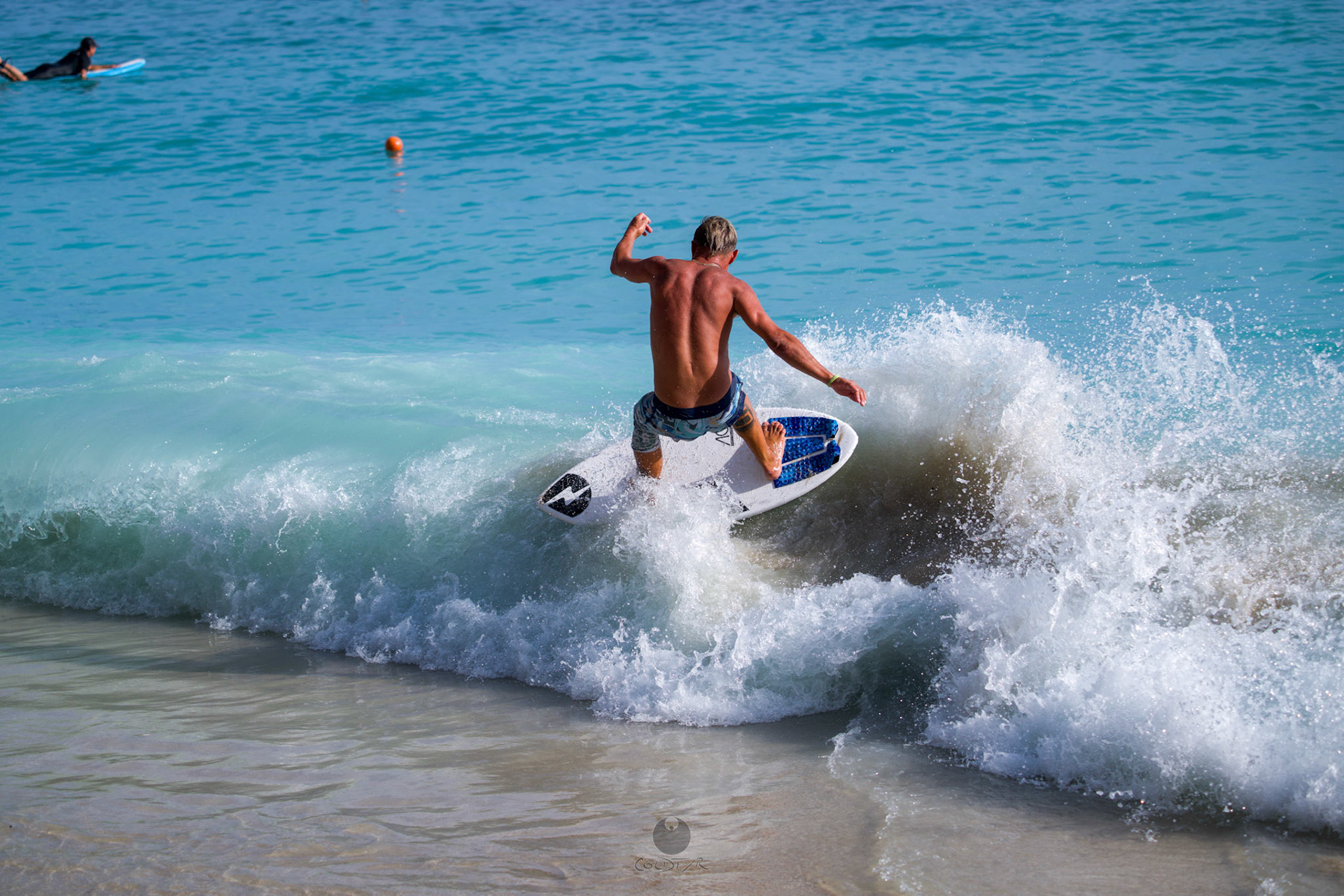 Brian "Hollywood" rips the Waikiki shore break.