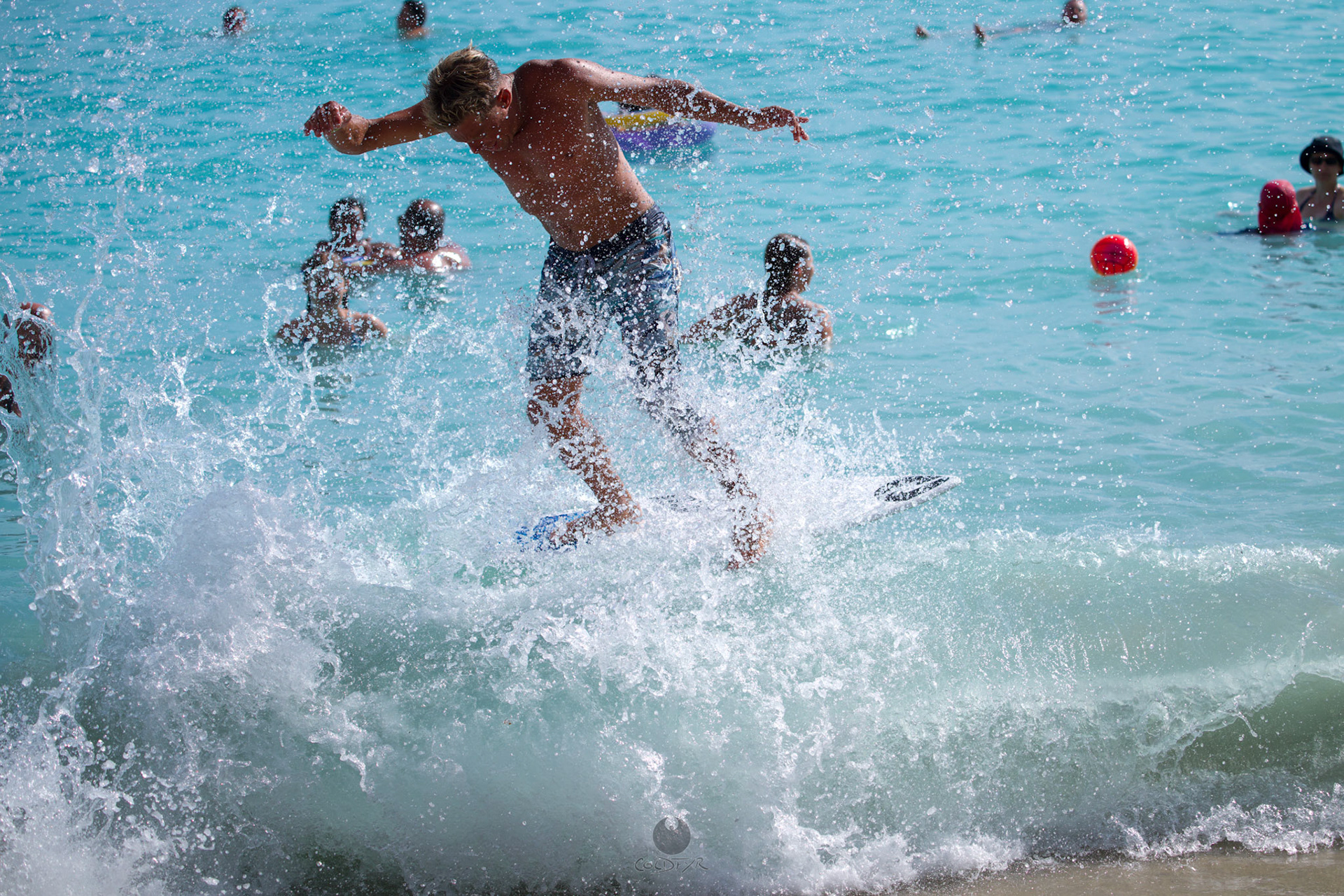 Brian "Hollywood" rips the Waikiki shore break.