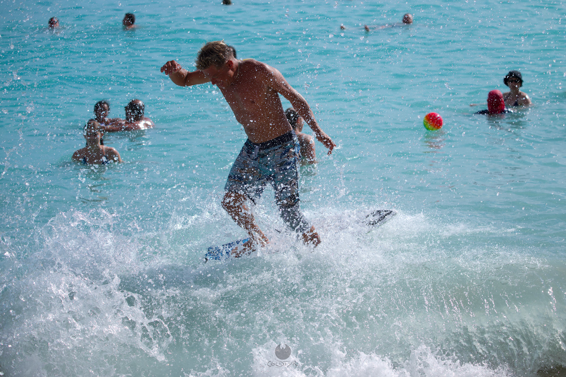 Brian "Hollywood" rips the Waikiki shore break.