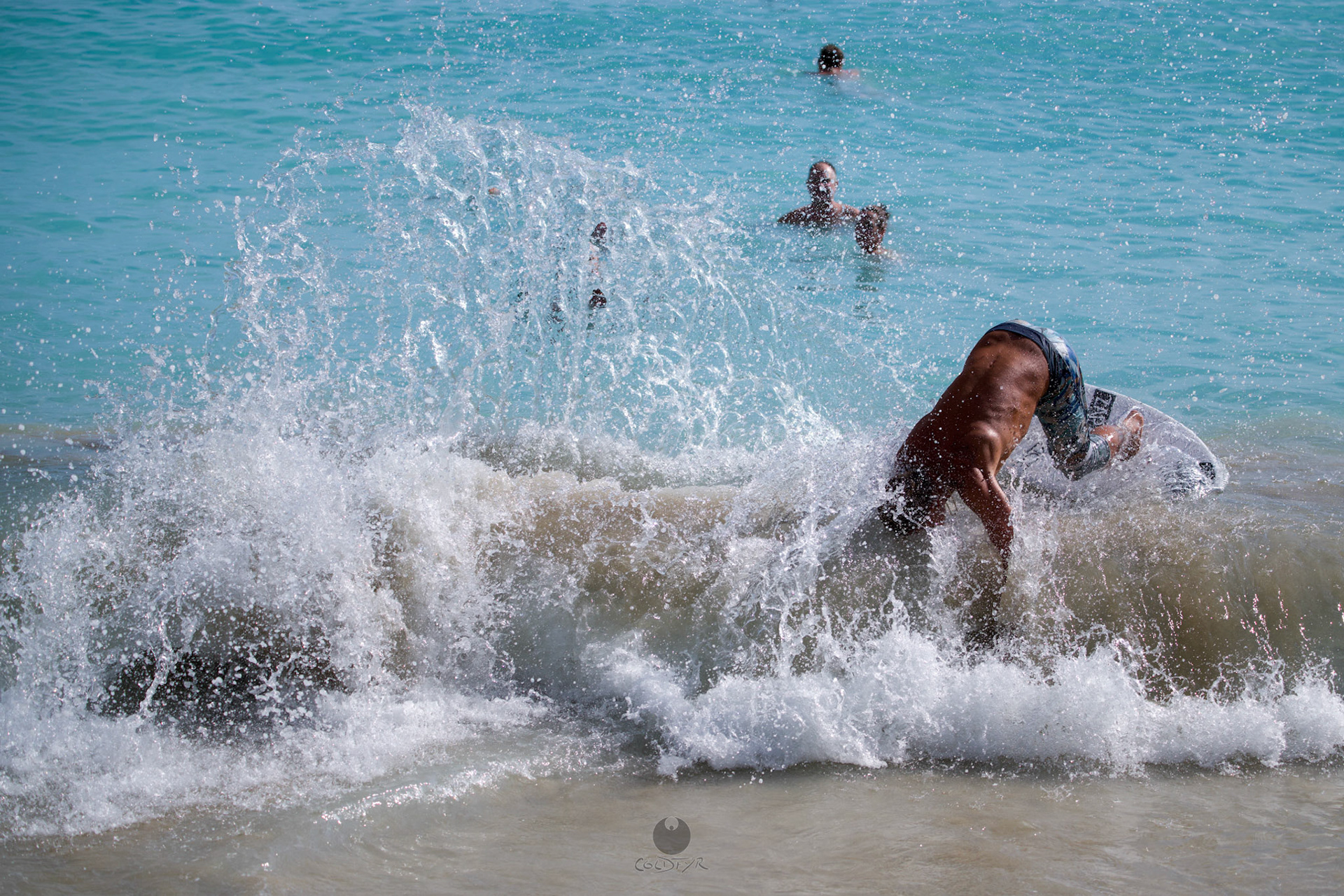 Brian "Hollywood" rips the Waikiki shore break.