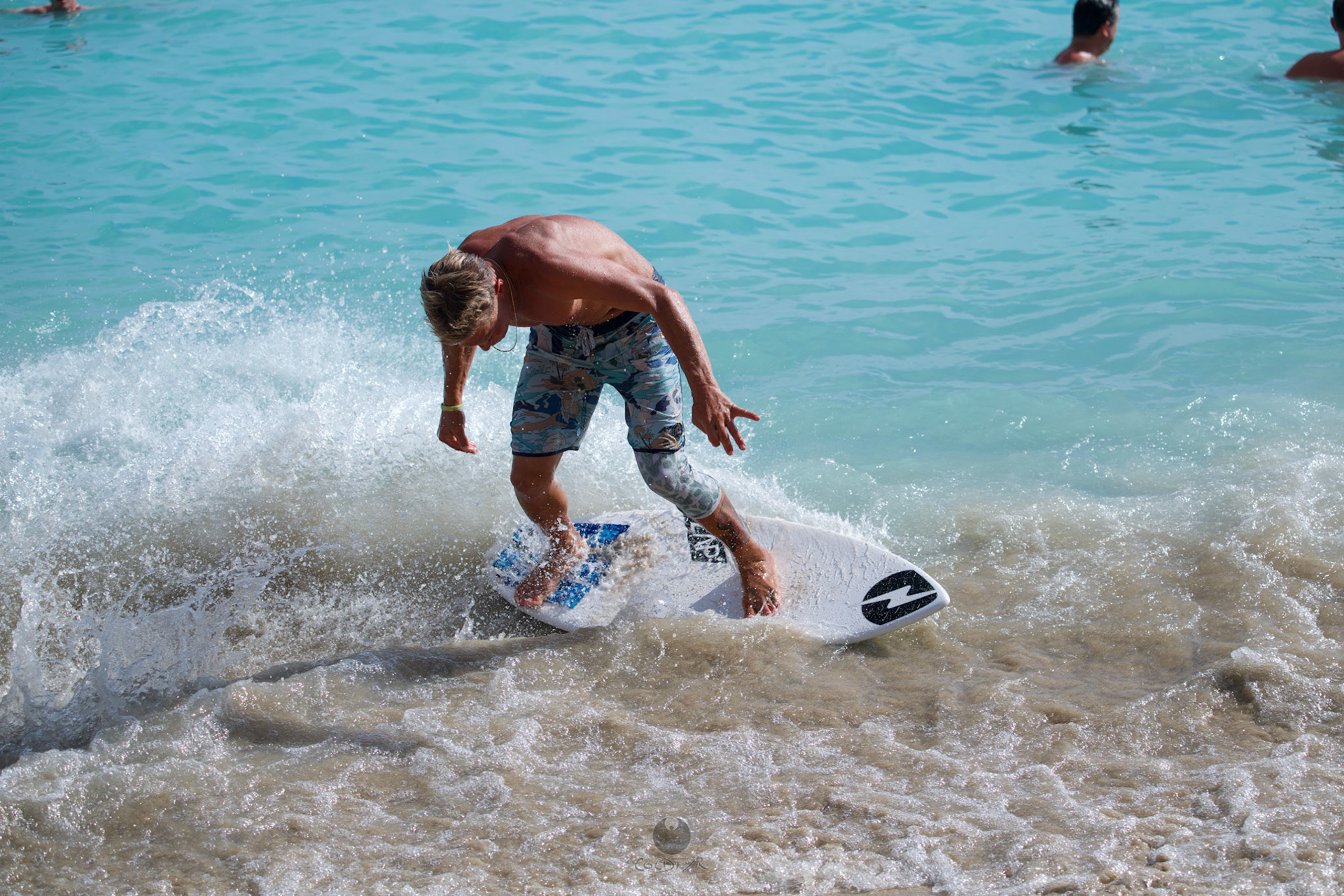 Brian "Hollywood" rips the Waikiki shore break.