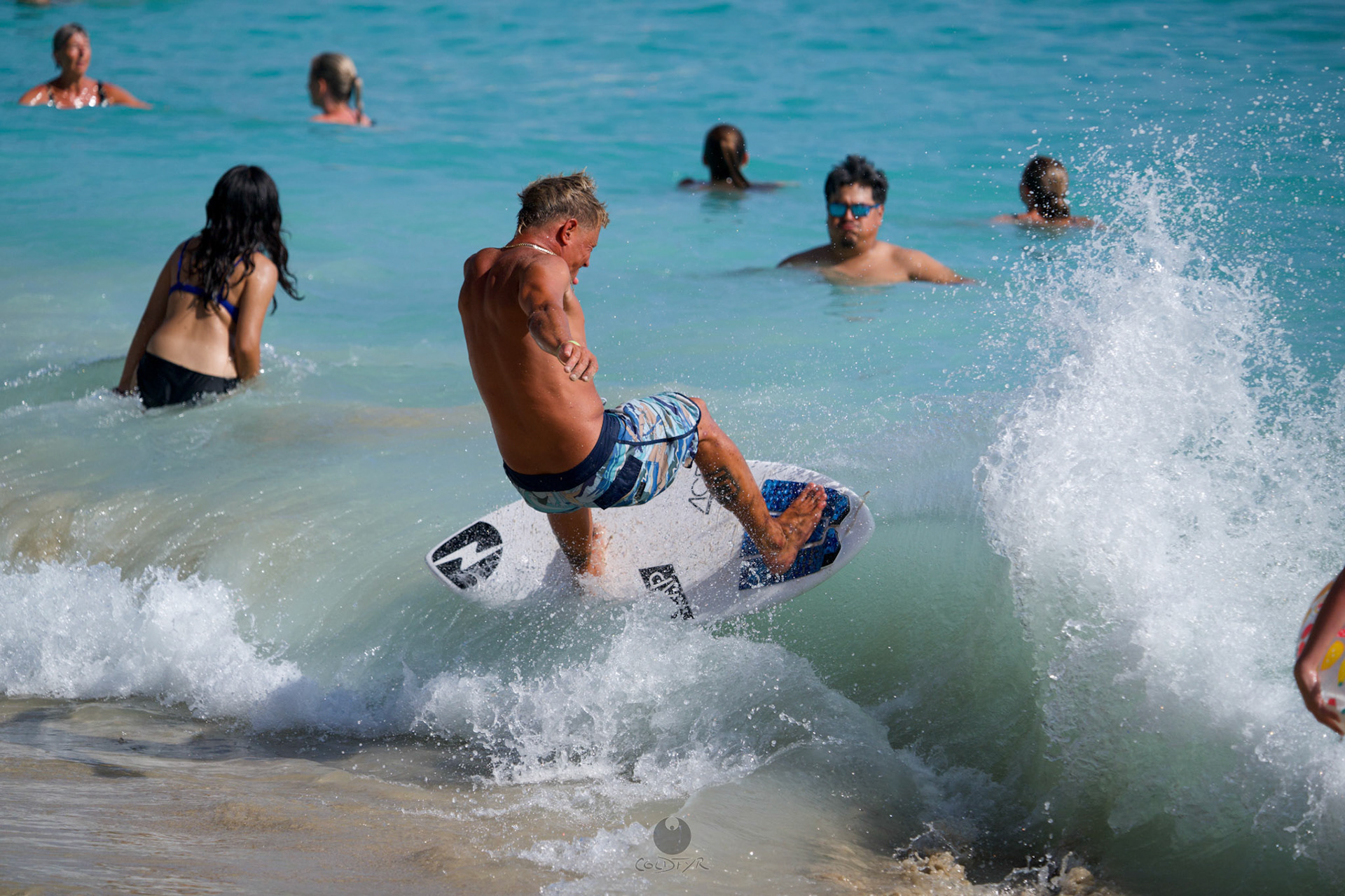 Brian "Hollywood" rips the Waikiki shore break.