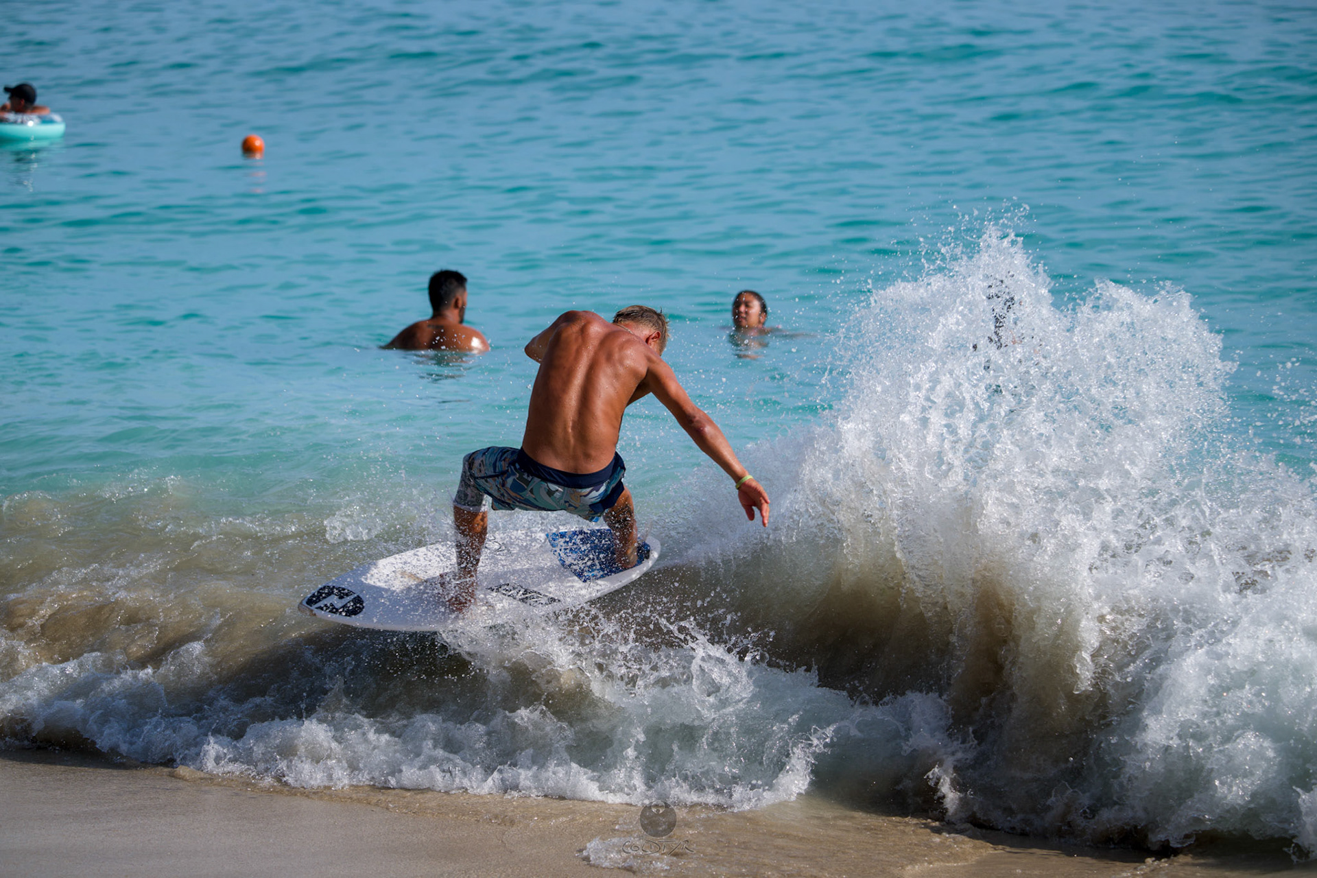 Brian "Hollywood" rips the Waikiki shore break.
