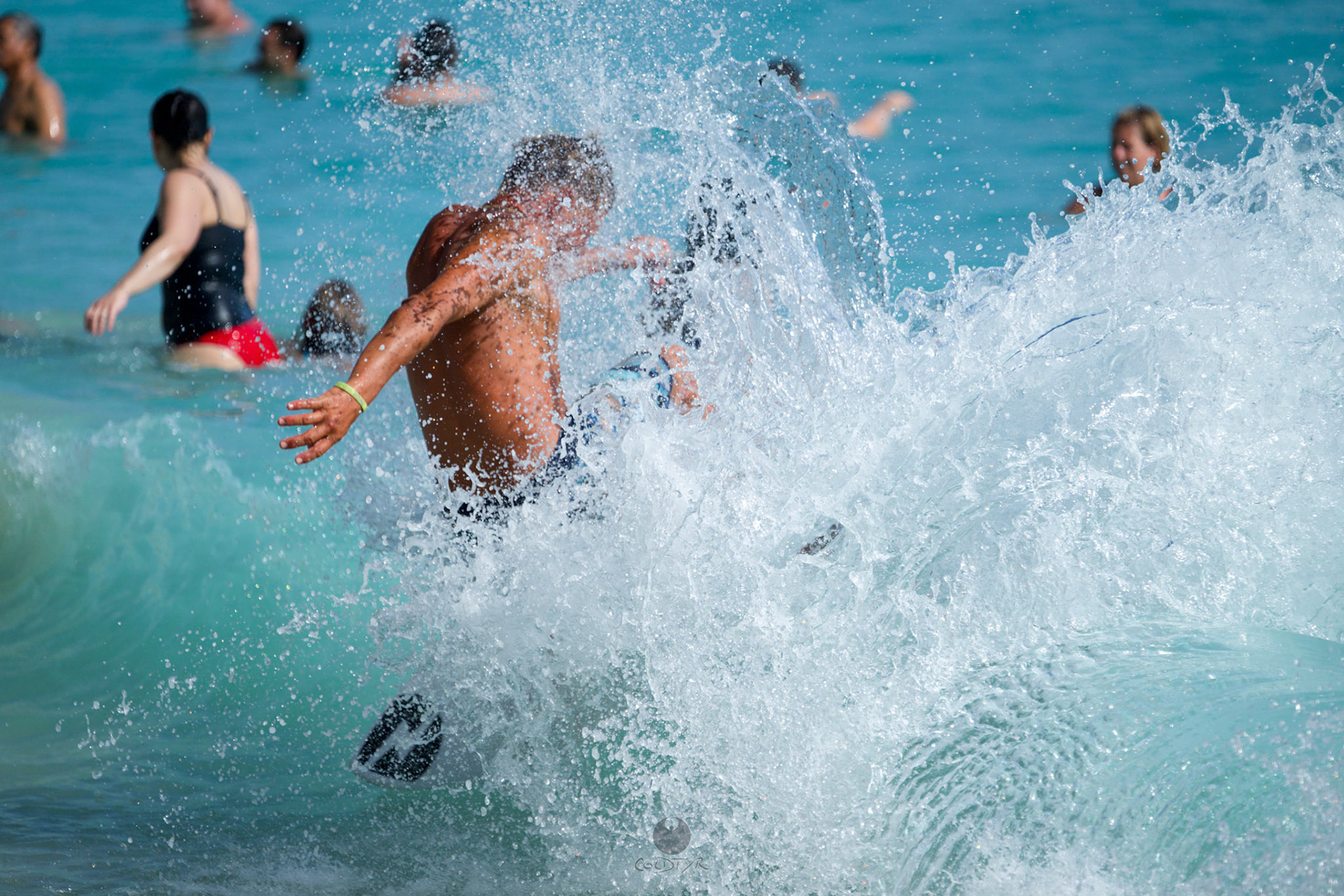 Brian "Hollywood" rips the Waikiki shore break.