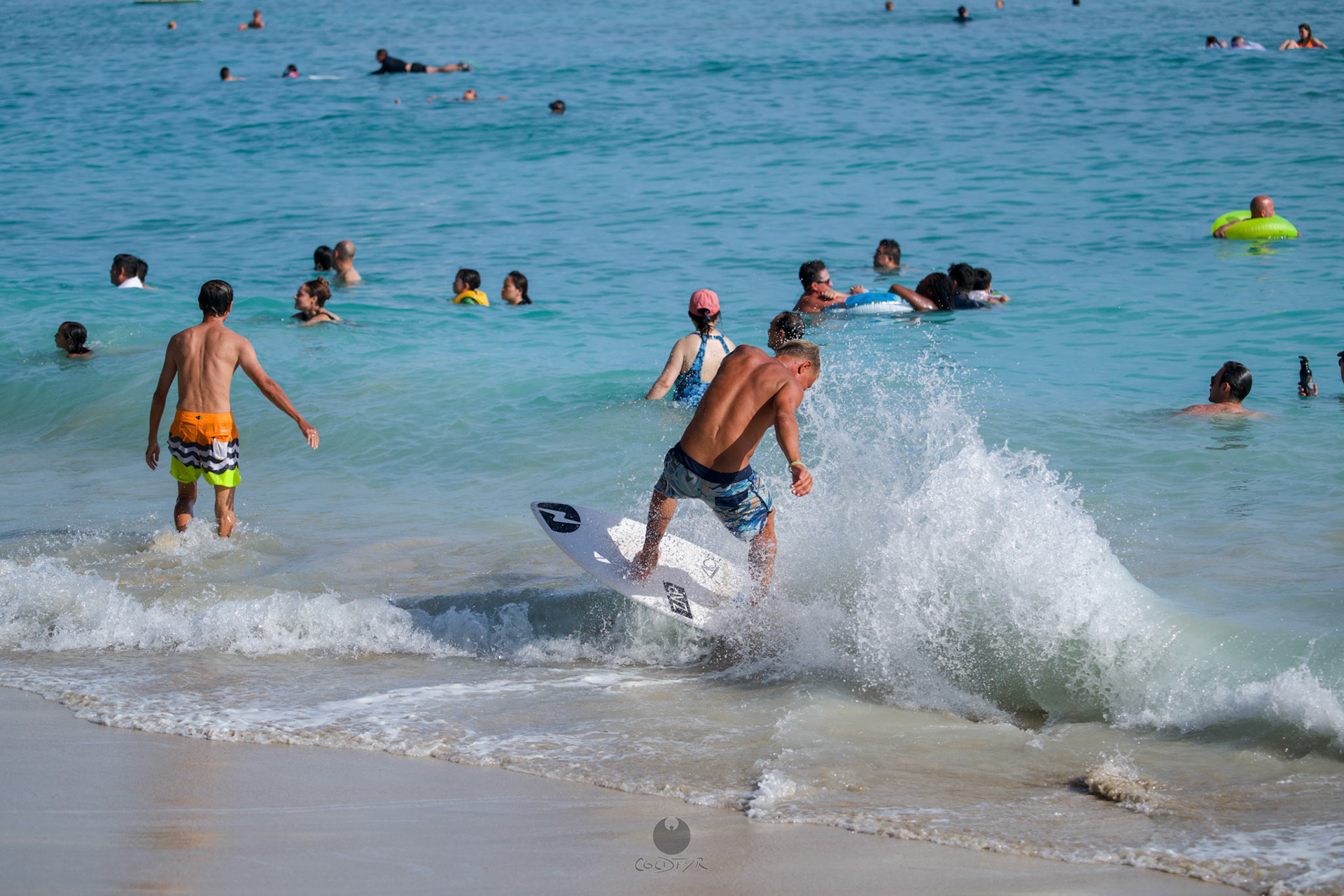 Brian "Hollywood" rips the Waikiki shore break.