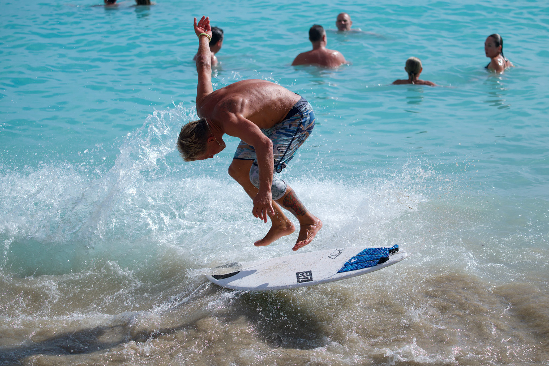 Brian "Hollywood" rips the Waikiki shore break.