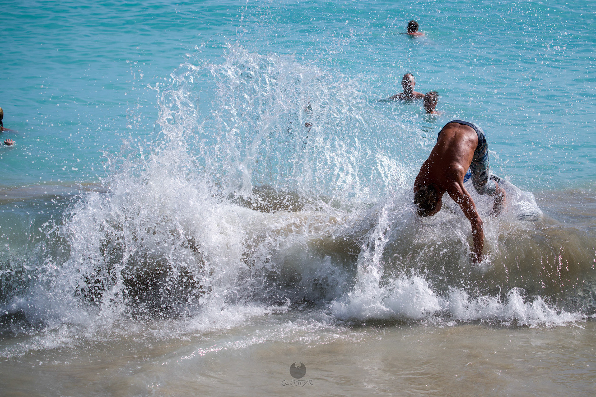 Brian "Hollywood" rips the Waikiki shore break.