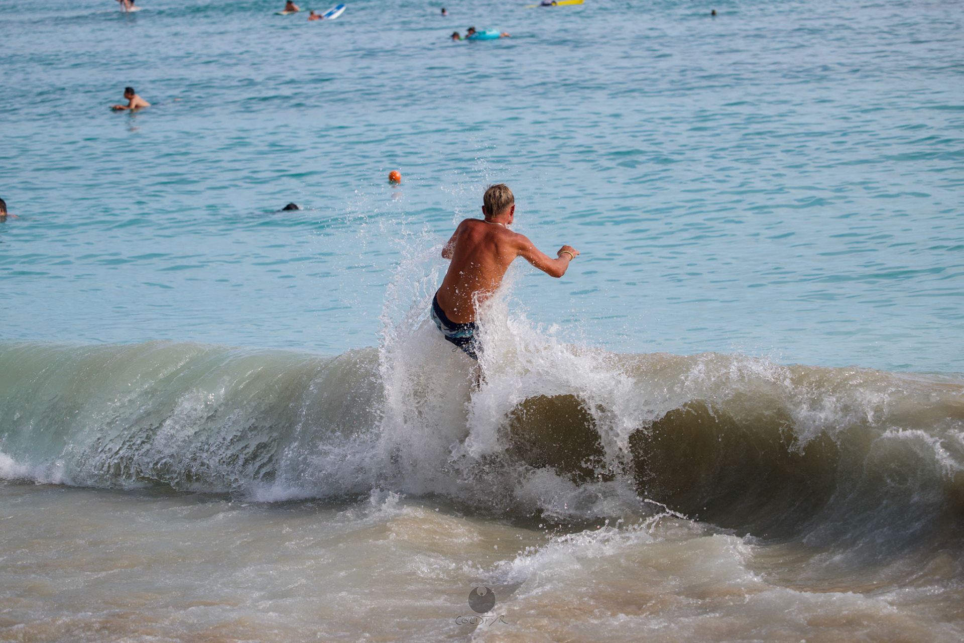 Brian "Hollywood" rips the Waikiki shore break.