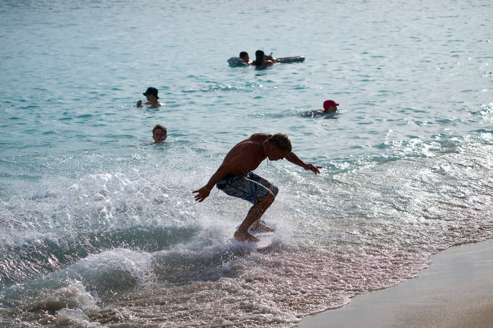 Brian "Hollywood" rips the Waikiki shore break.