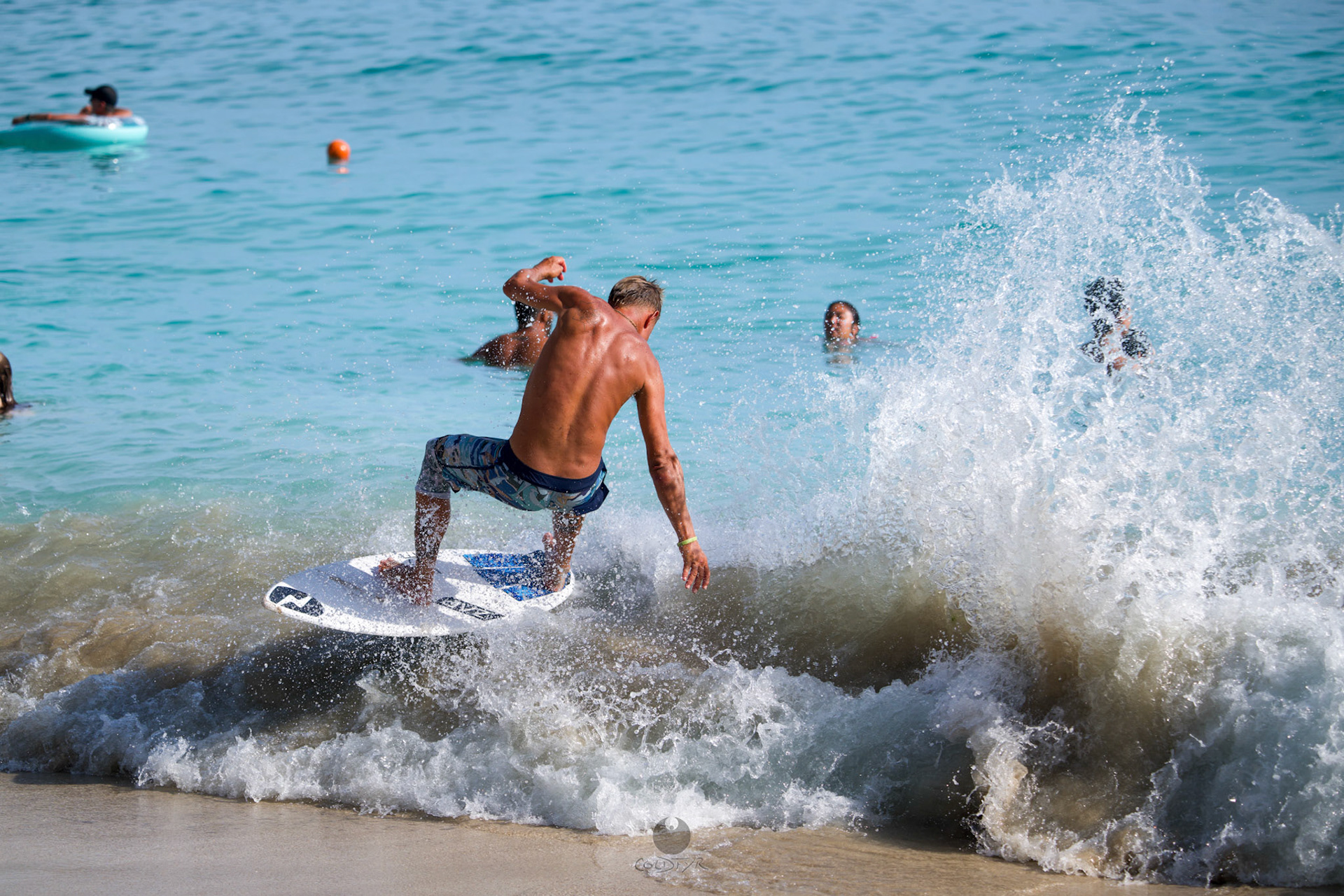 Brian "Hollywood" rips the Waikiki shore break.