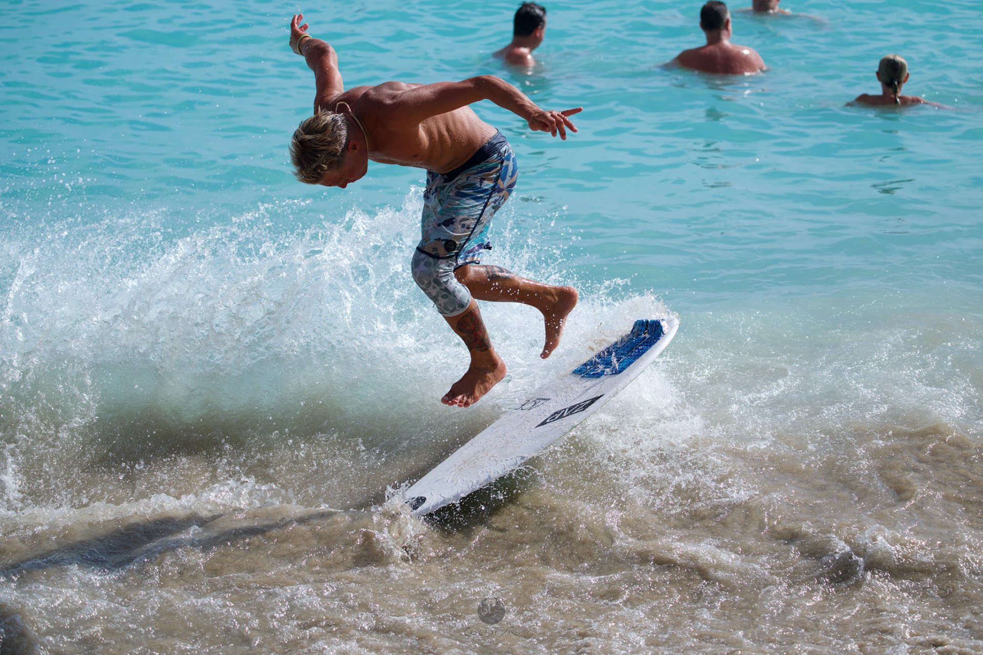 Brian "Hollywood" rips the Waikiki shore break.