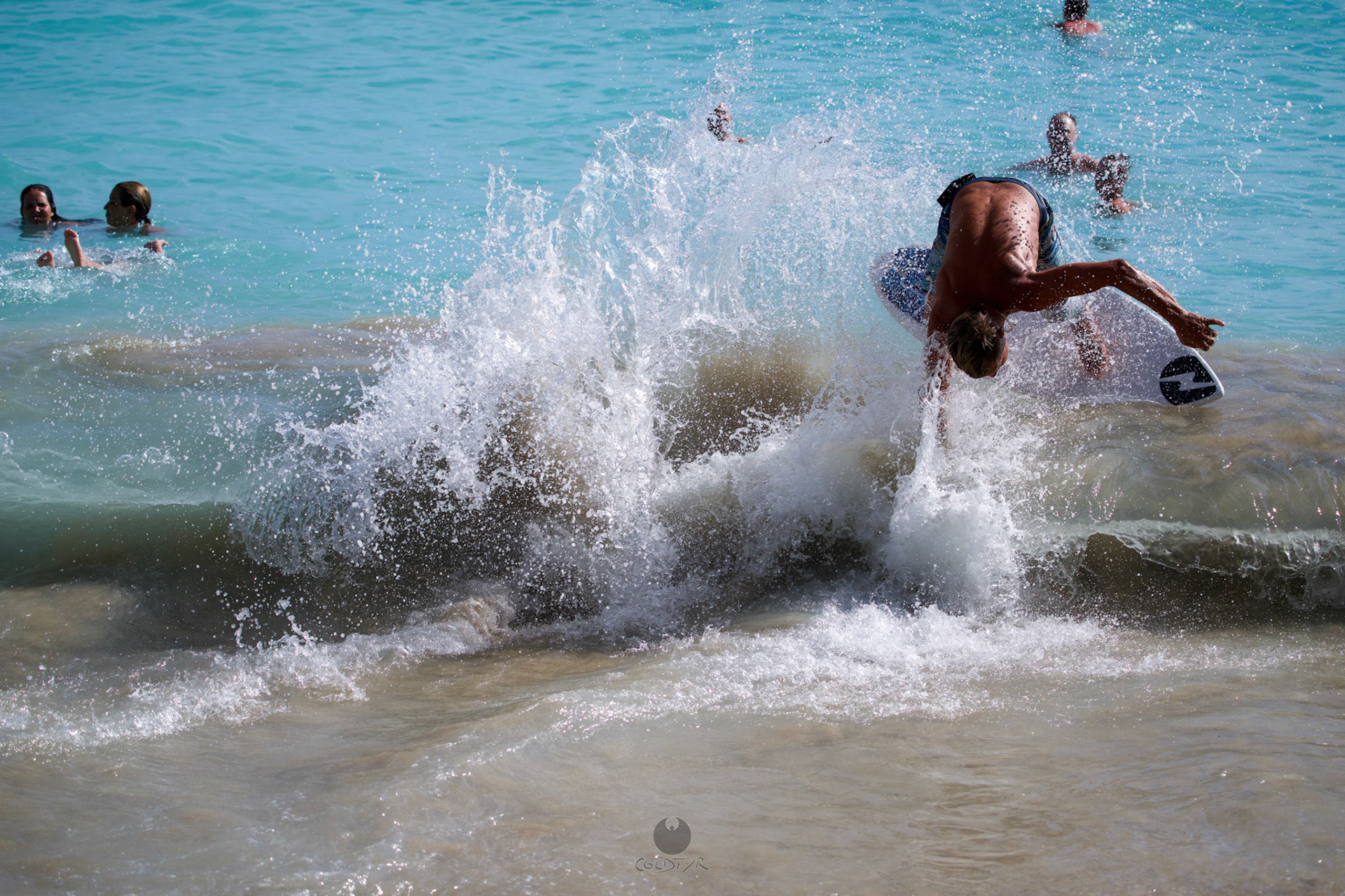Brian "Hollywood" rips the Waikiki shore break.