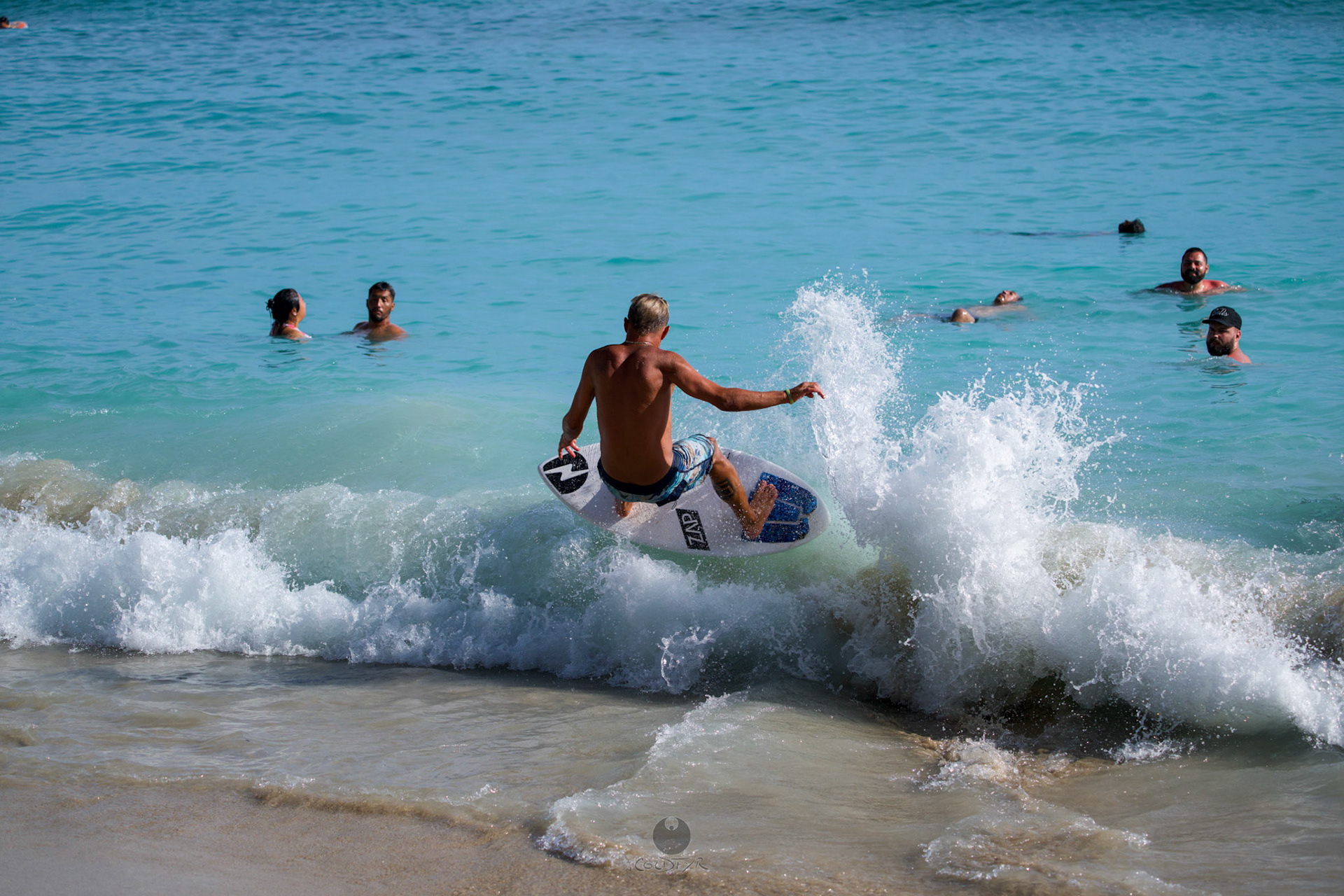 Brian "Hollywood" rips the Waikiki shore break.