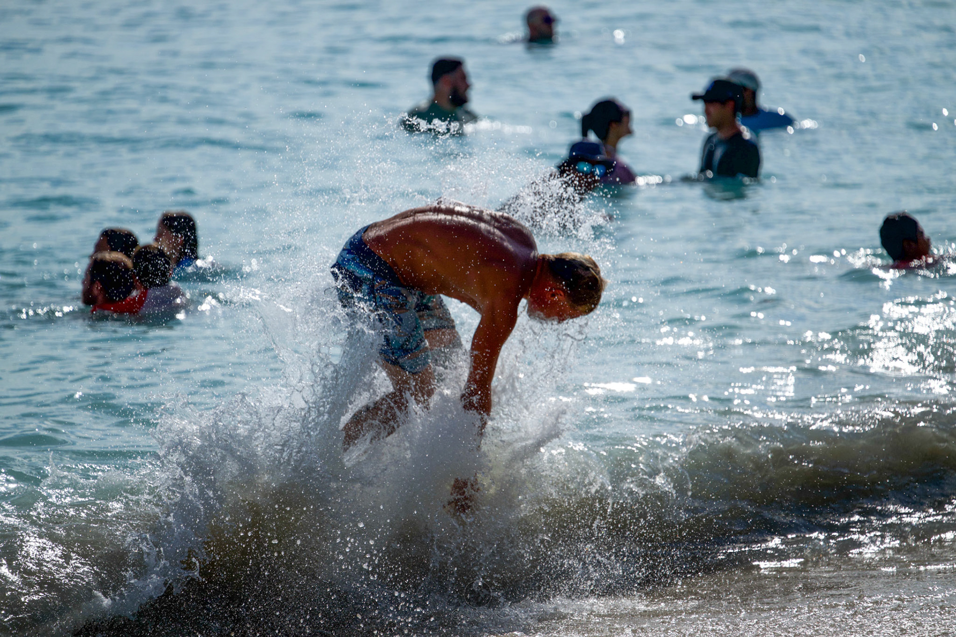 Brian "Hollywood" rips the Waikiki shore break.