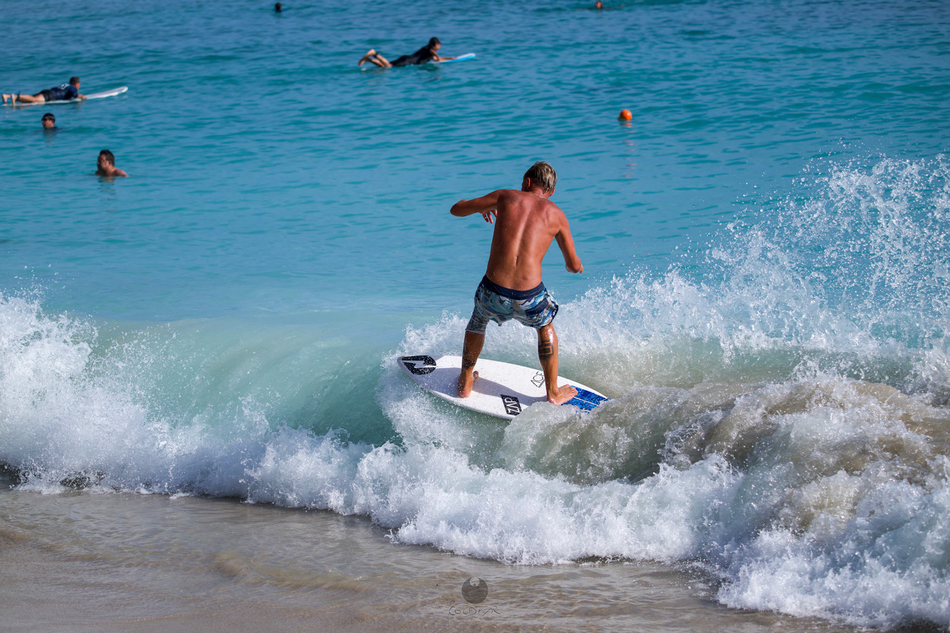 Brian "Hollywood" rips the Waikiki shore break.