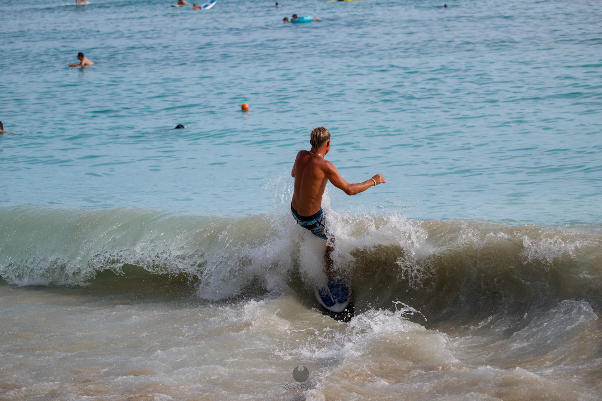 Brian "Hollywood" rips the Waikiki shore break.