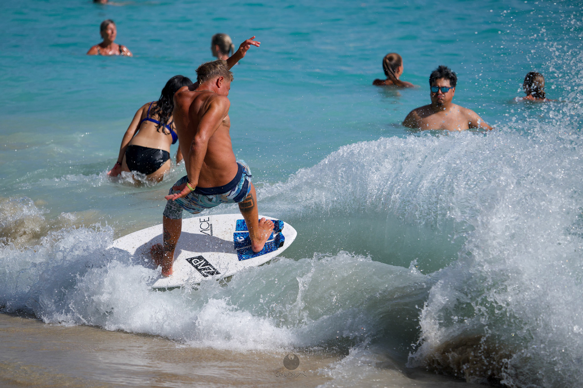 Brian "Hollywood" rips the Waikiki shore break.