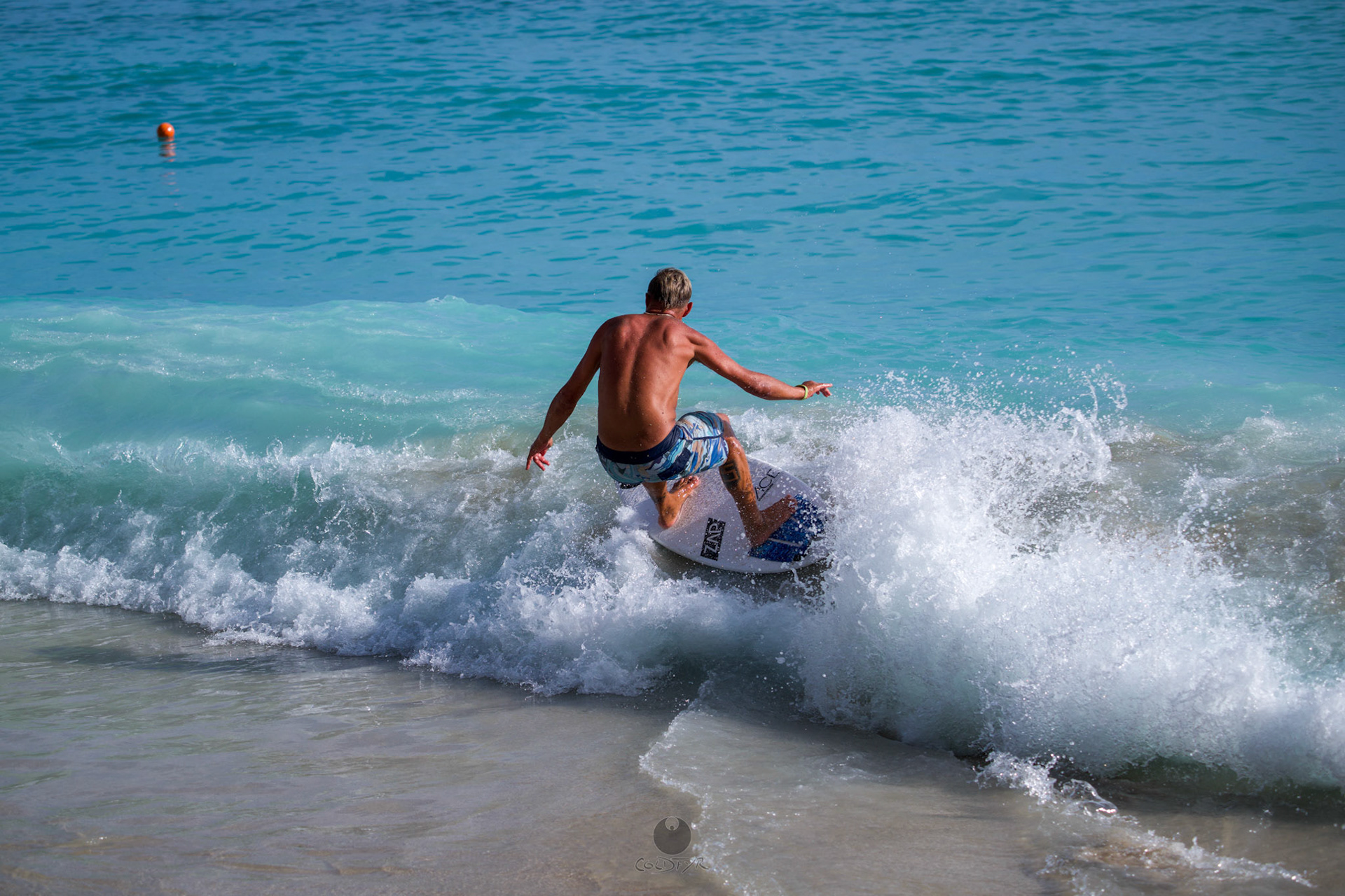 Brian "Hollywood" rips the Waikiki shore break.