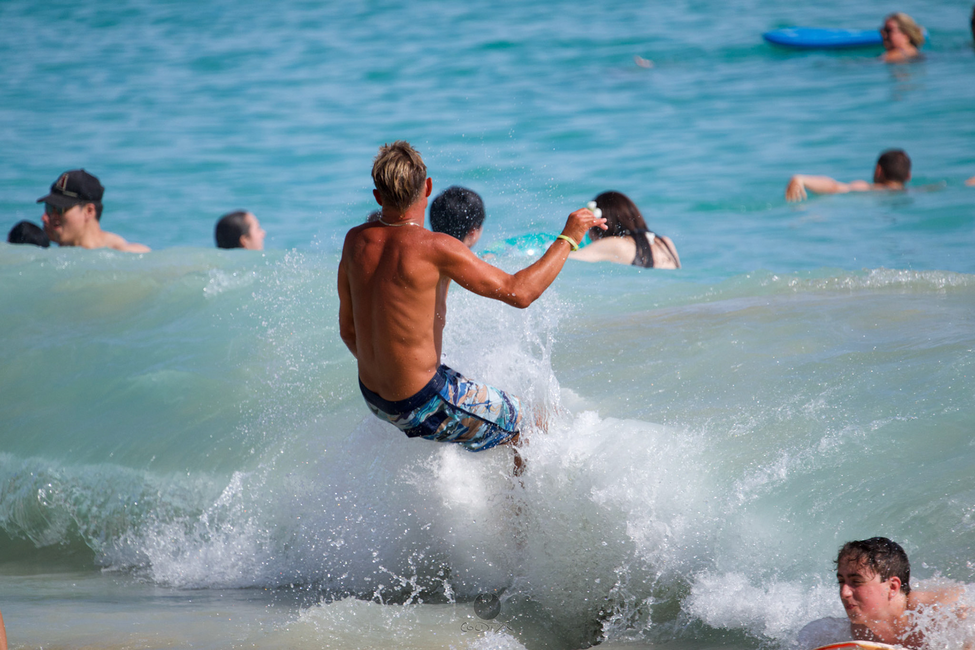 Brian "Hollywood" rips the Waikiki shore break.