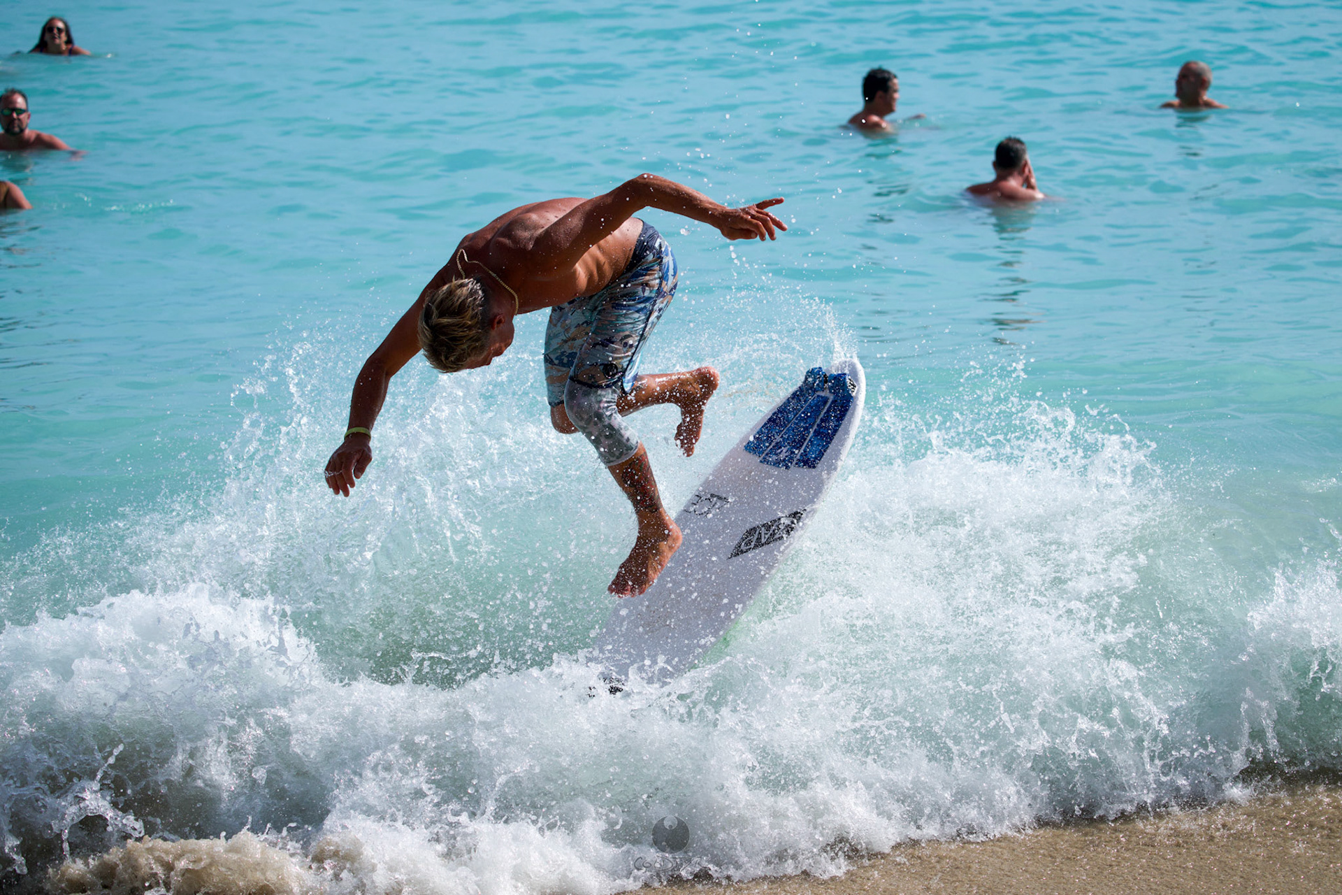 Brian "Hollywood" rips the Waikiki shore break.