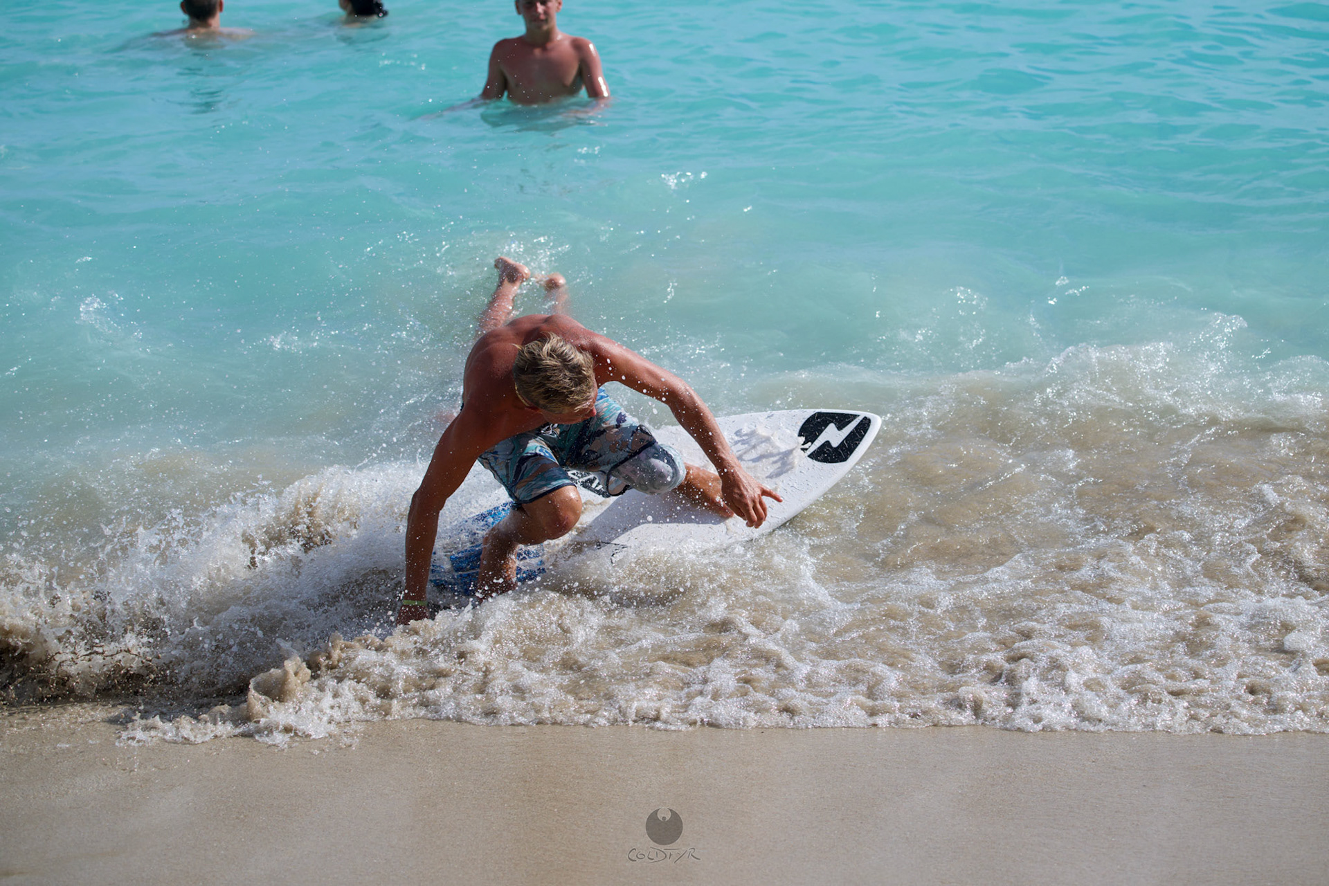 Brian "Hollywood" rips the Waikiki shore break.