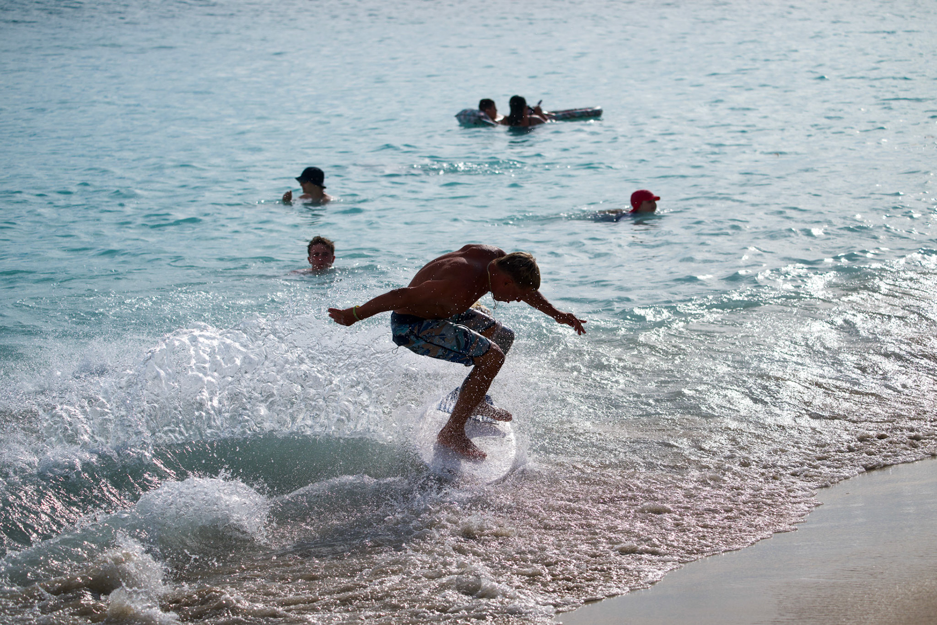 Brian "Hollywood" rips the Waikiki shore break.