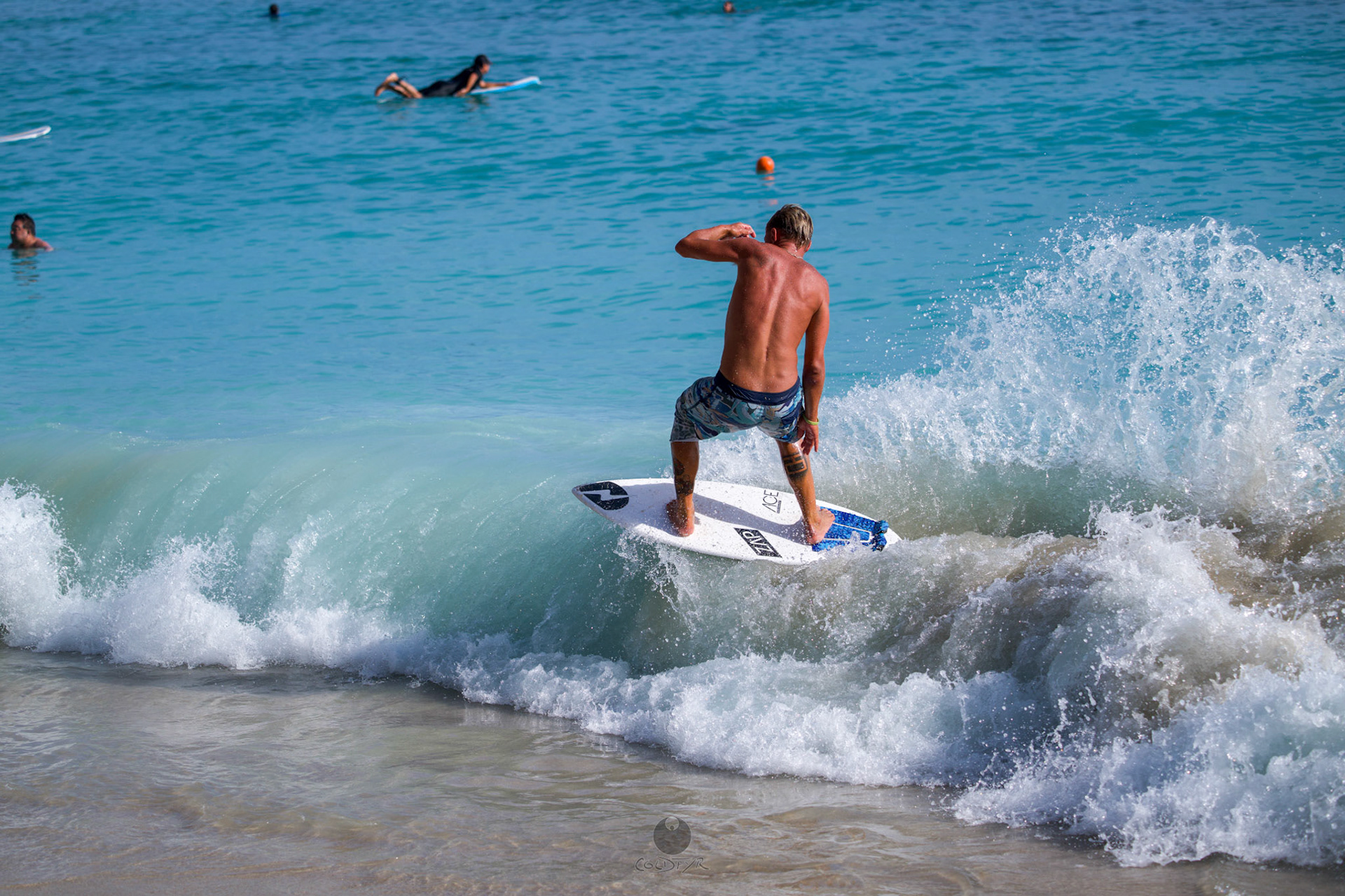 Brian "Hollywood" rips the Waikiki shore break.