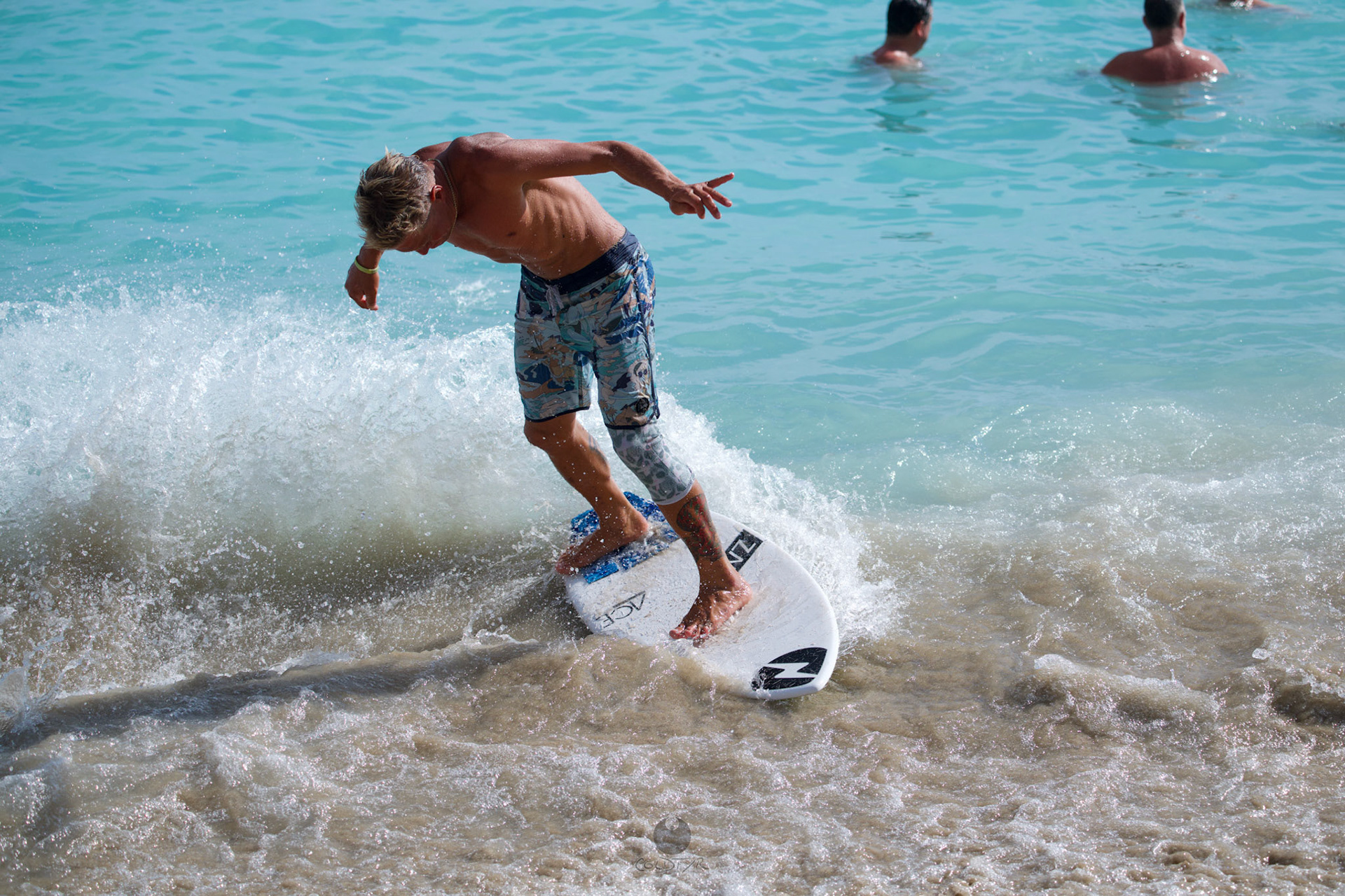 Brian "Hollywood" rips the Waikiki shore break.