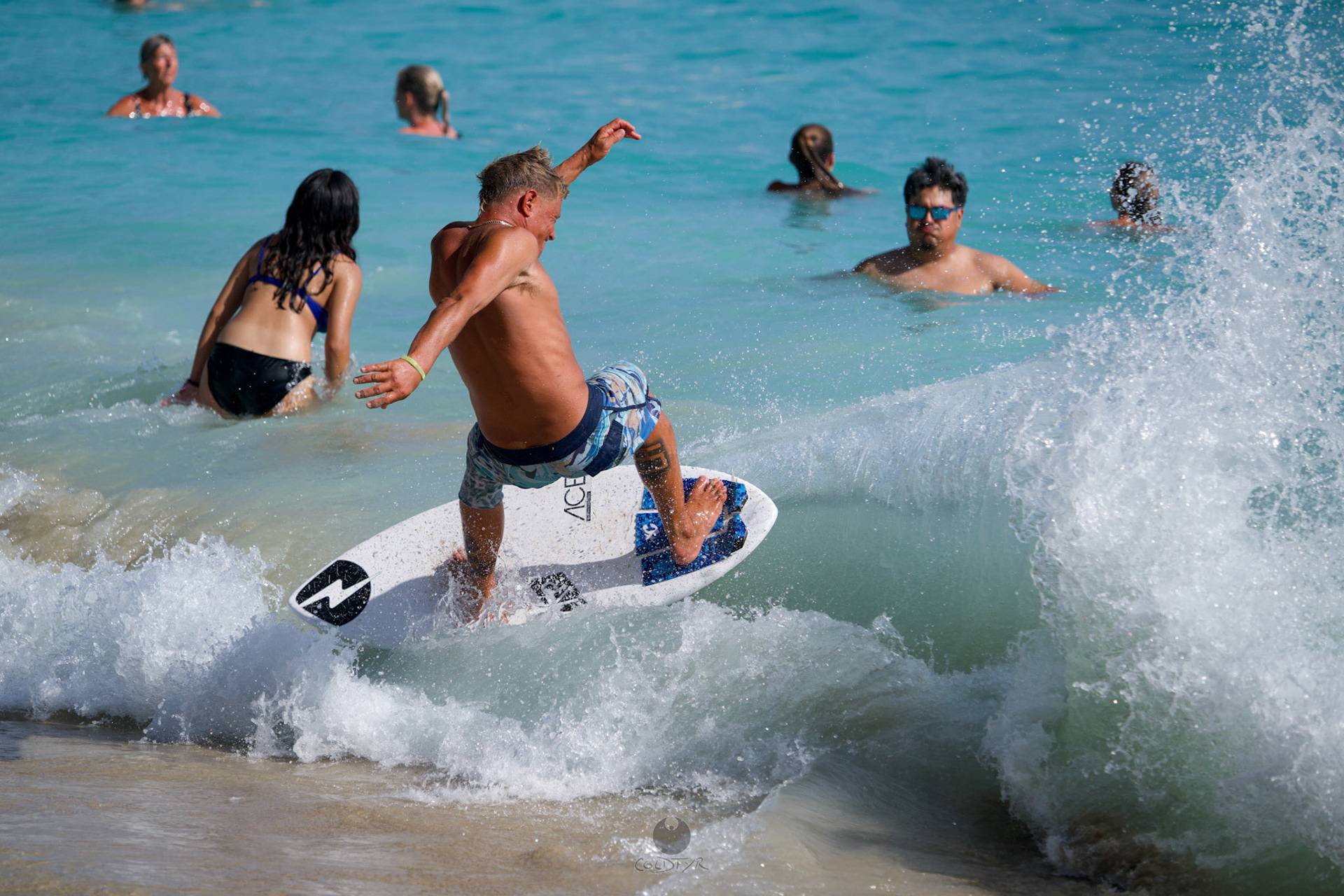 Brian "Hollywood" rips the Waikiki shore break.