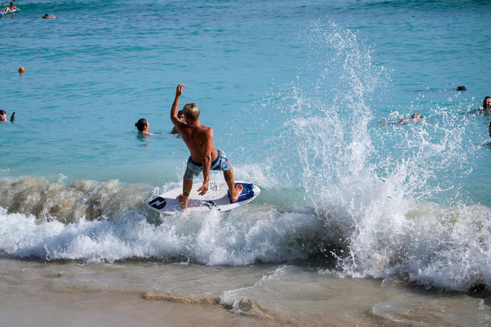 Brian "Hollywood" rips the Waikiki shore break.