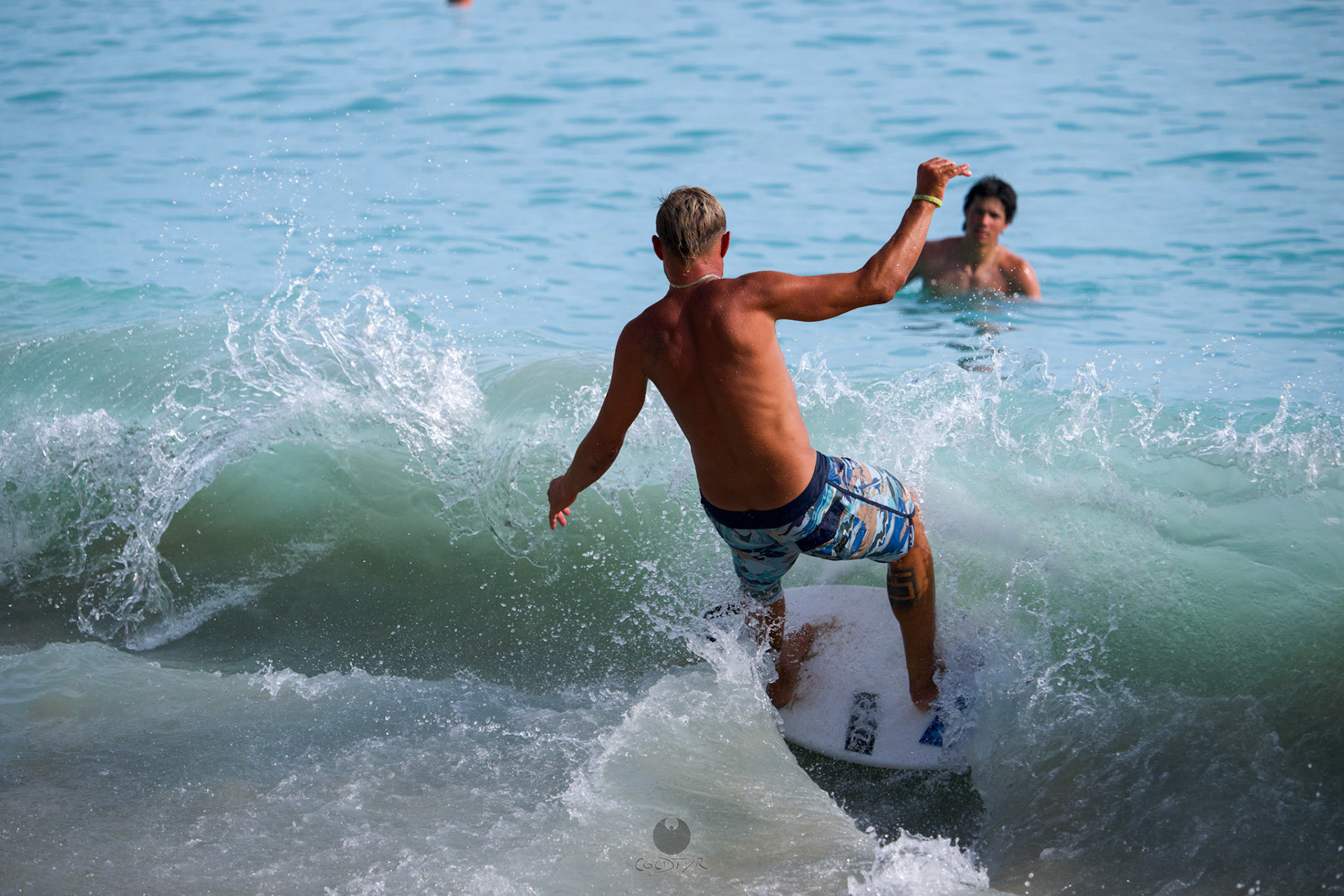 Brian "Hollywood" rips the Waikiki shore break.