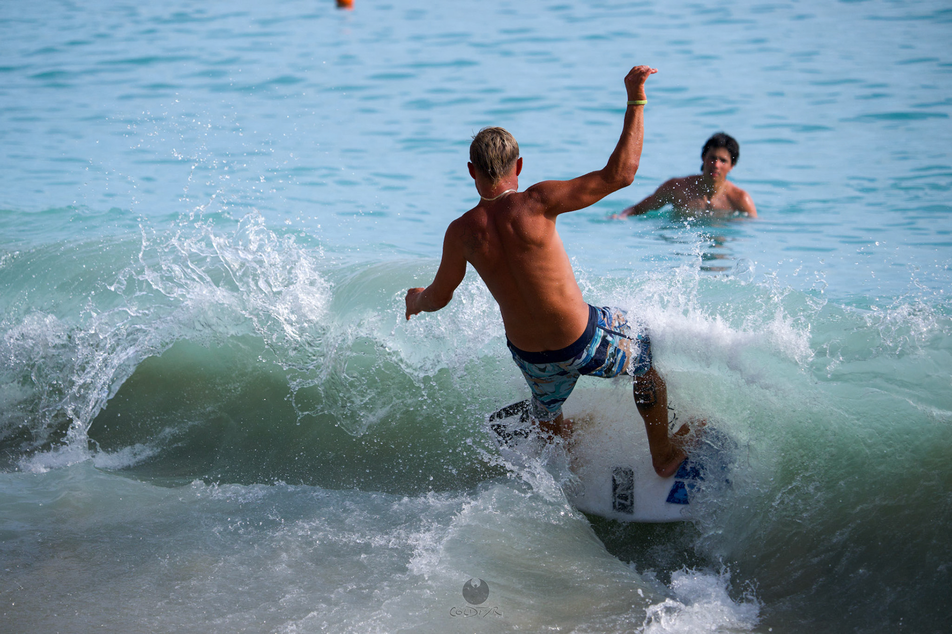 Brian "Hollywood" rips the Waikiki shore break.