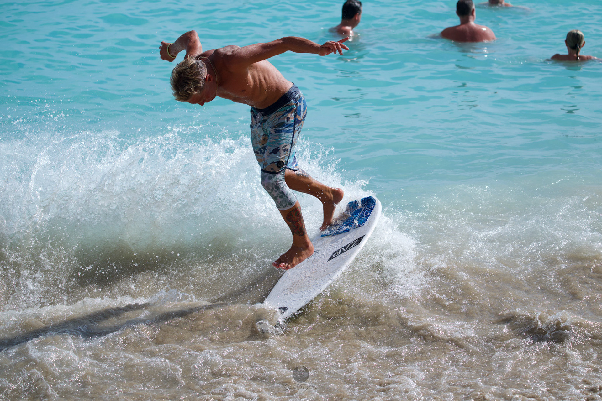 Brian "Hollywood" rips the Waikiki shore break.